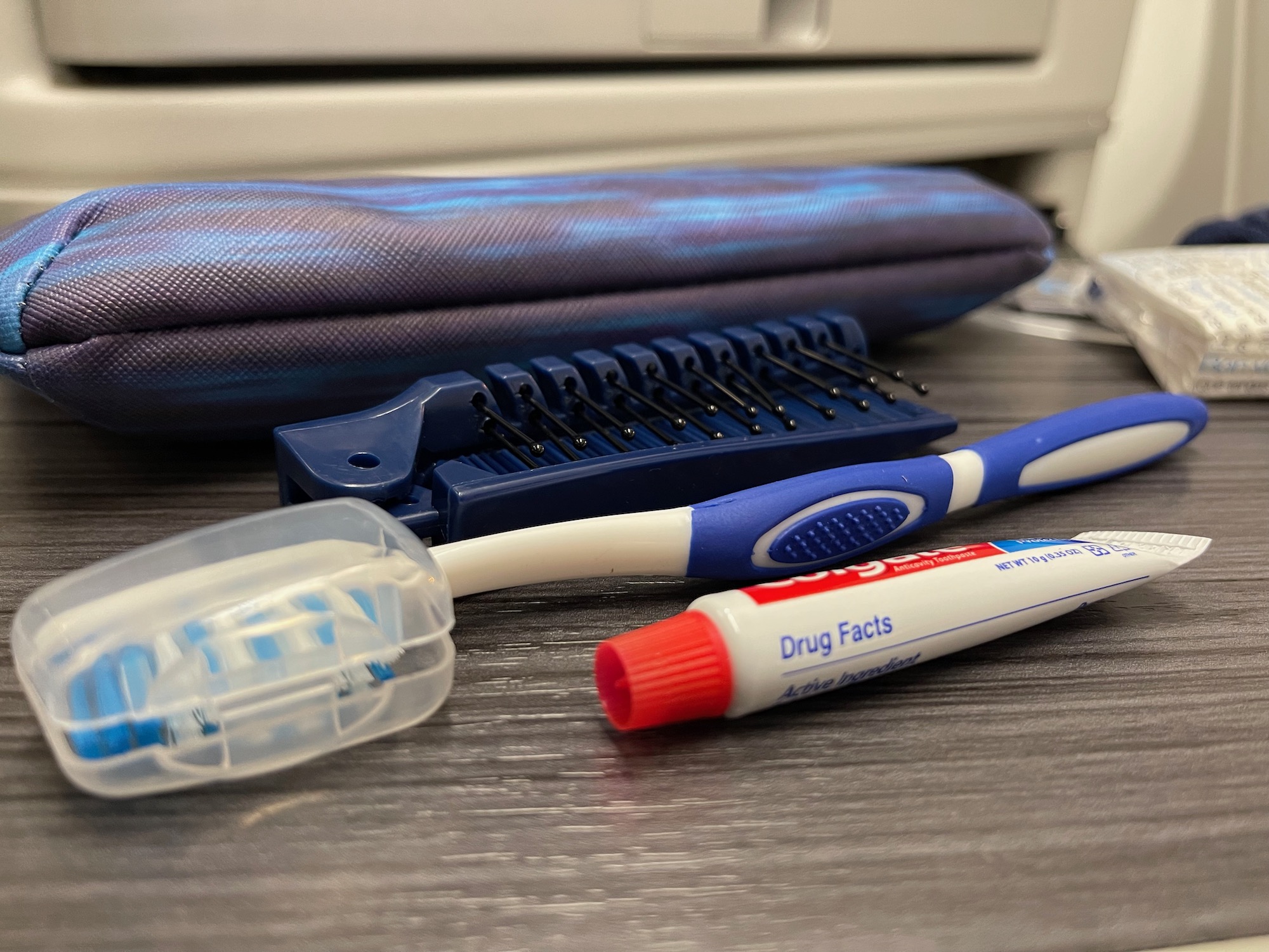 a toothbrush and toothpaste next to a toothbrush