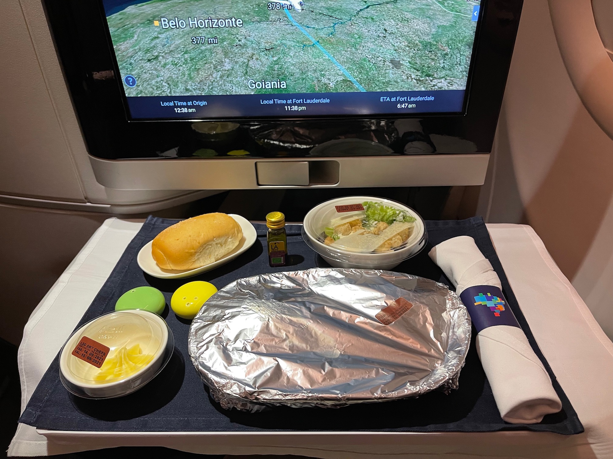 food on a table with a television