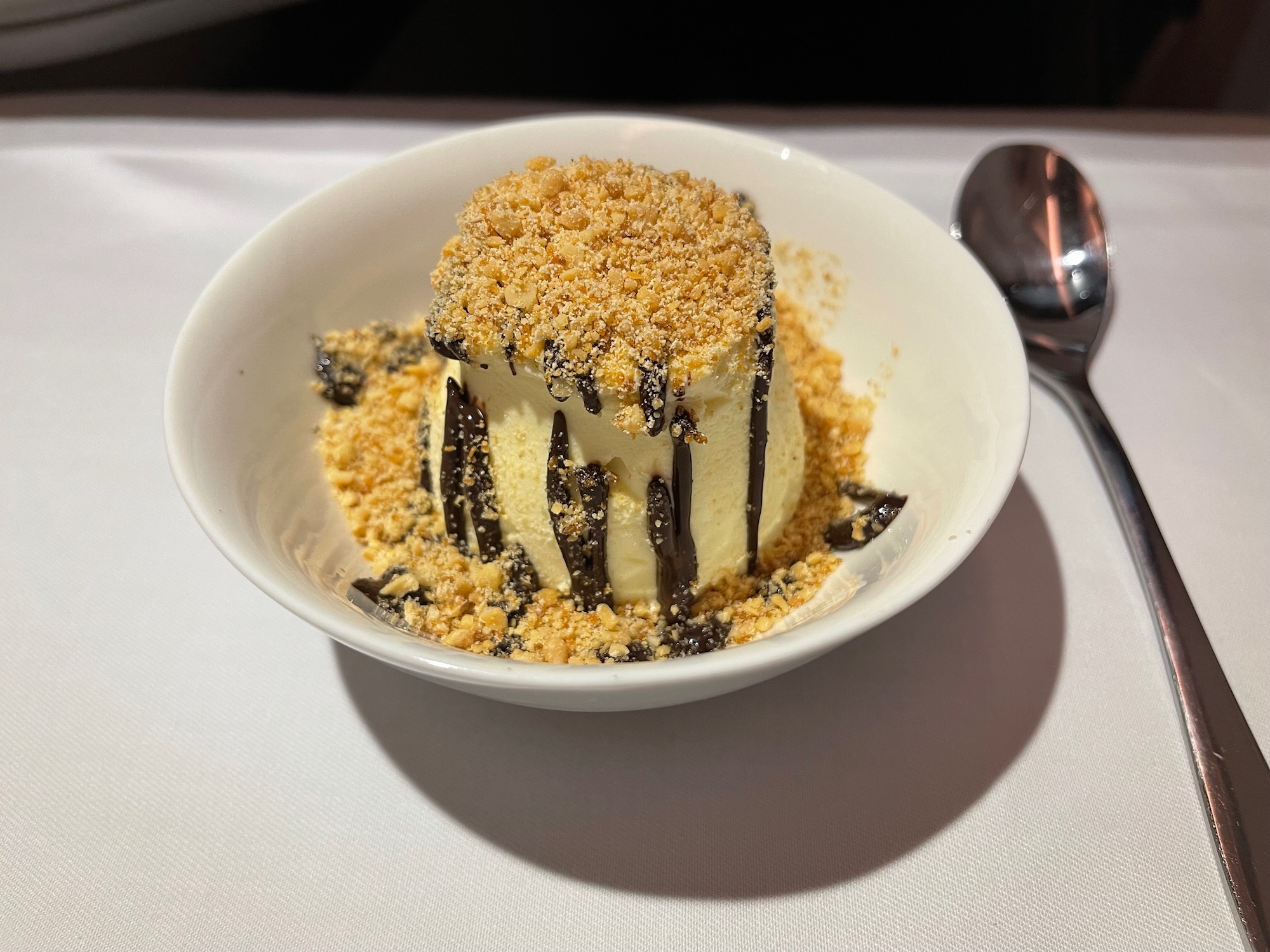 a dessert in a bowl with a spoon