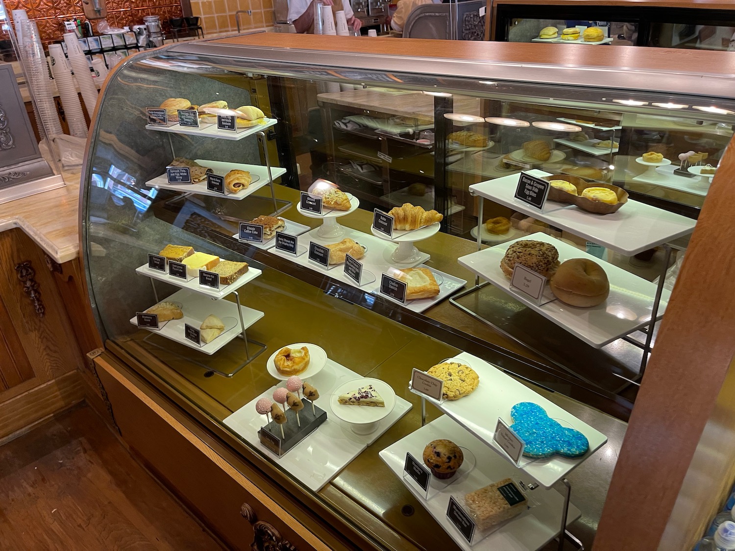 a display case with pastries and pastries