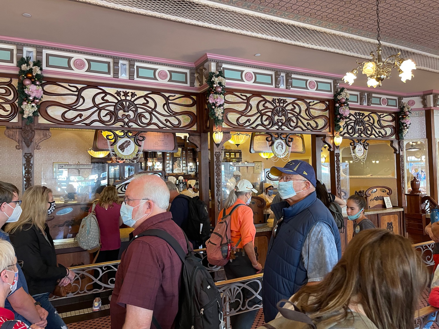 people in a restaurant with masks