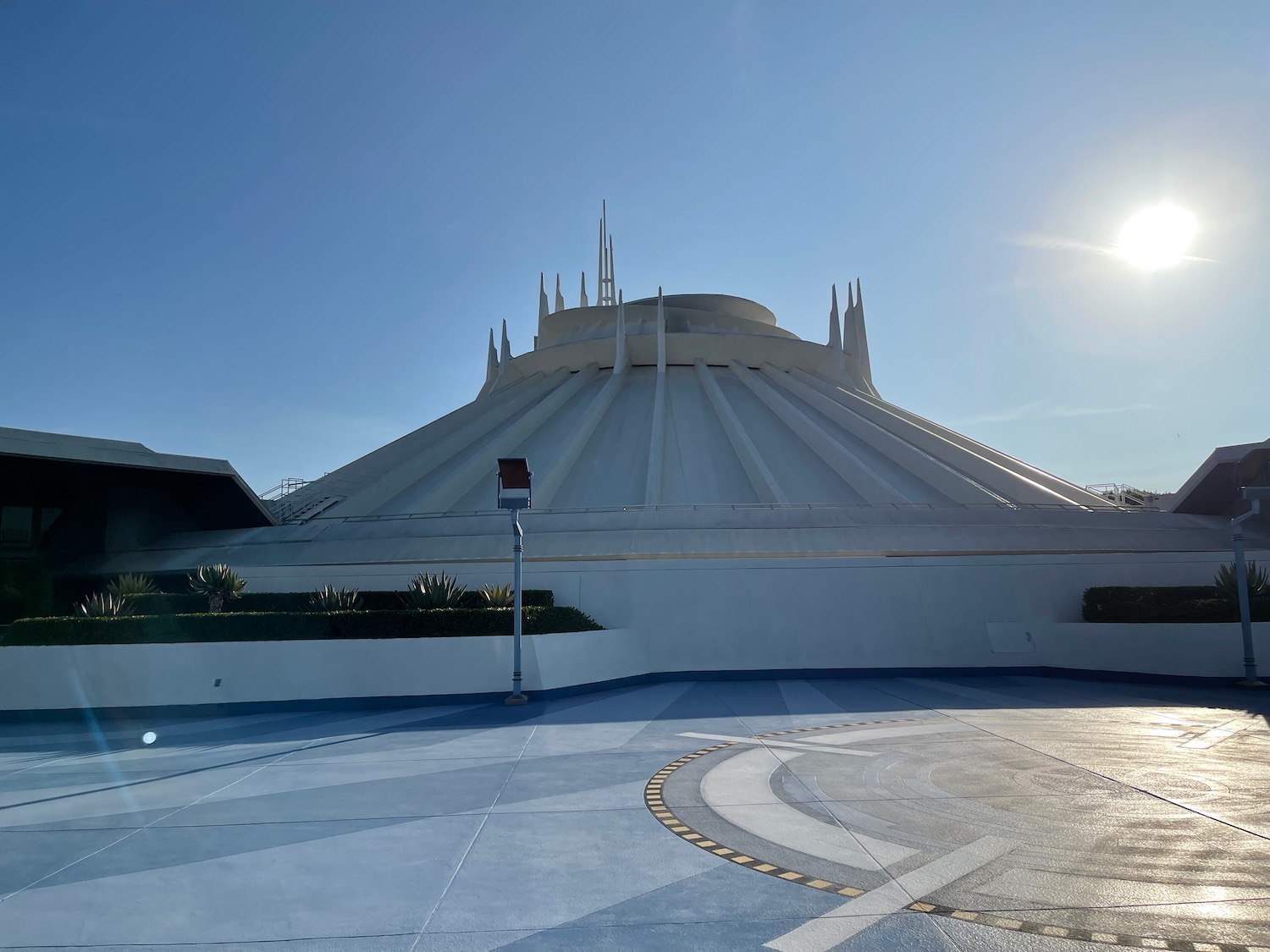 a white building with a round roof