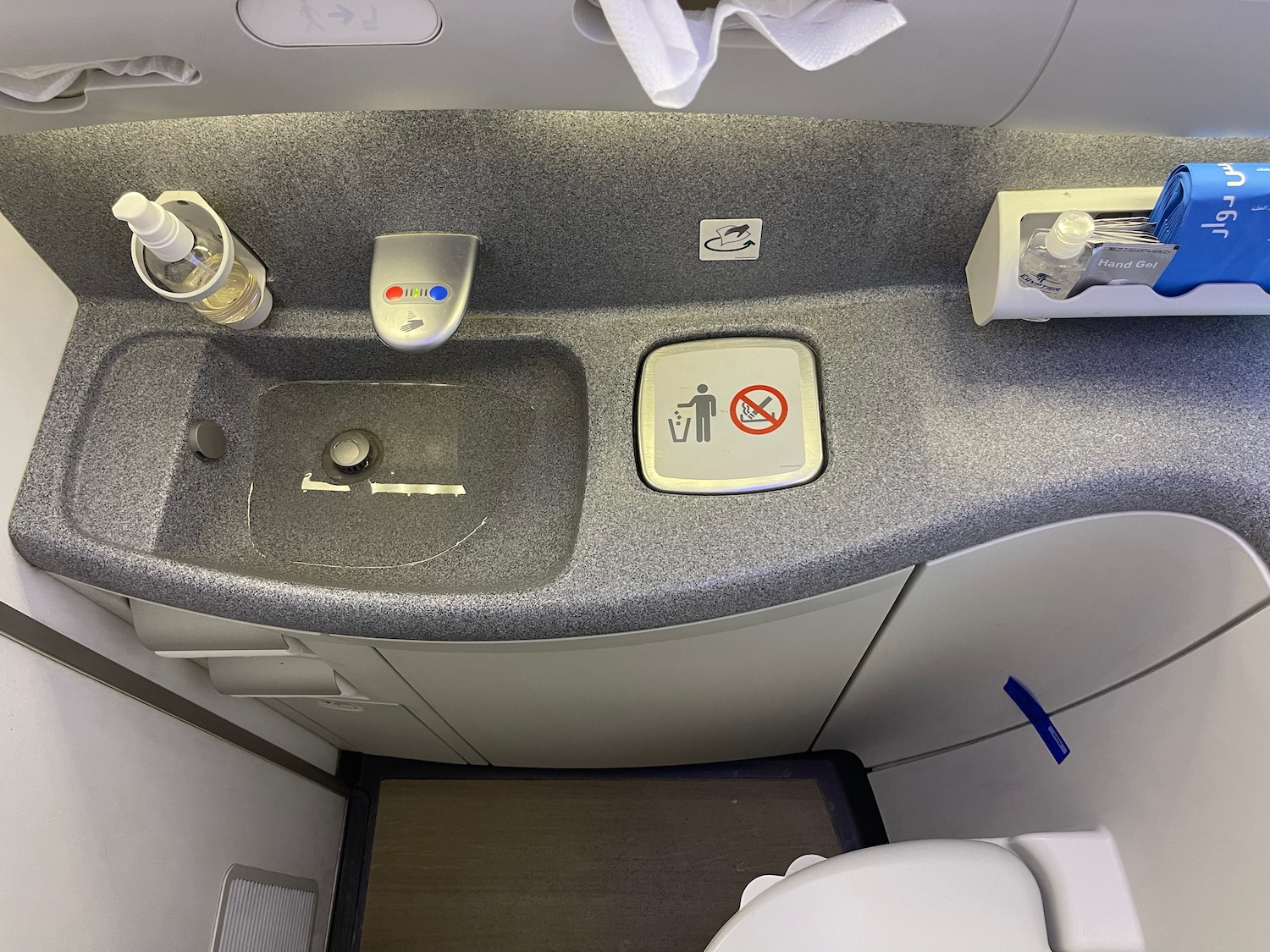 a sink and toilet in an airplane