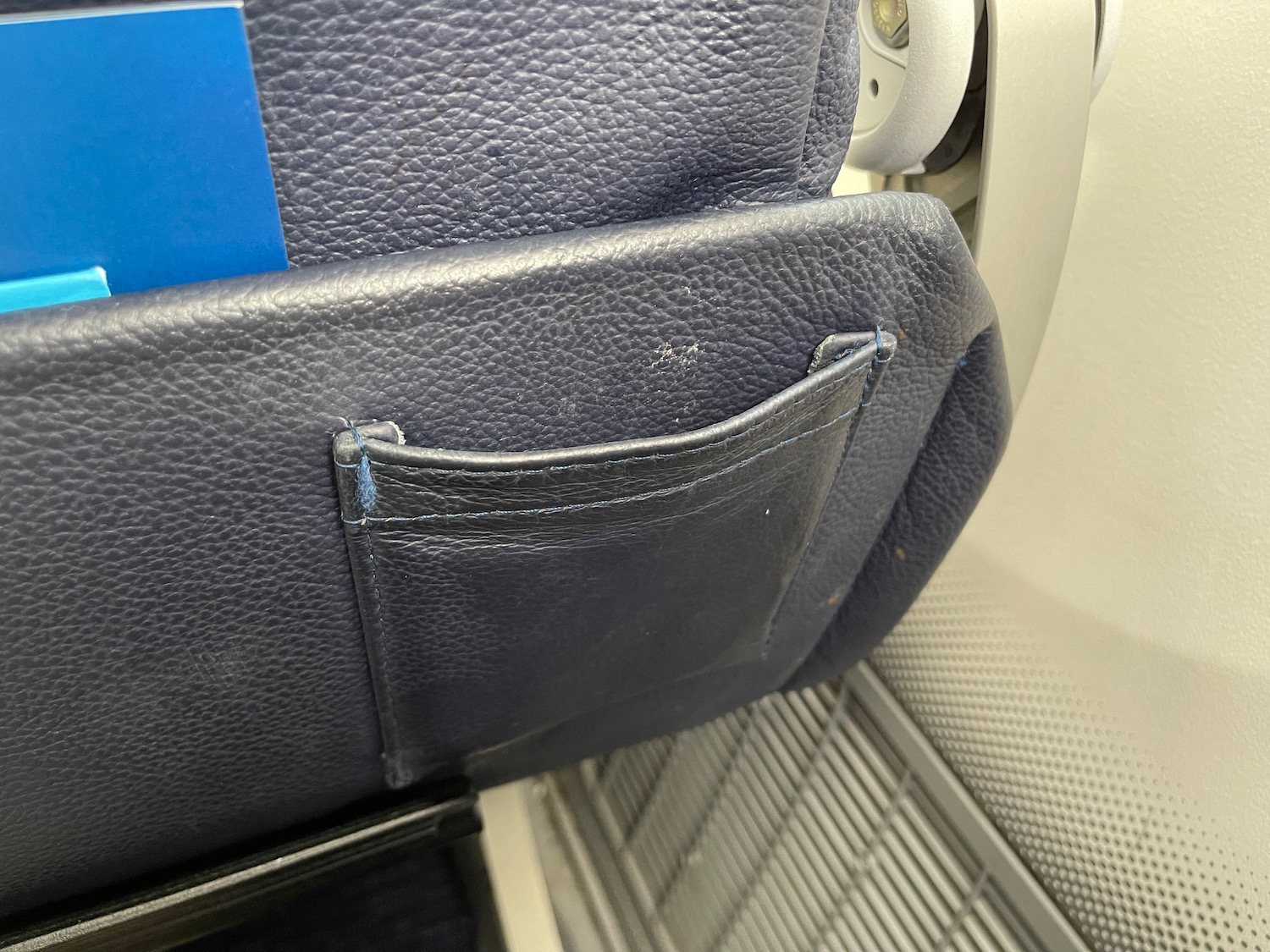 a pocket on a seat