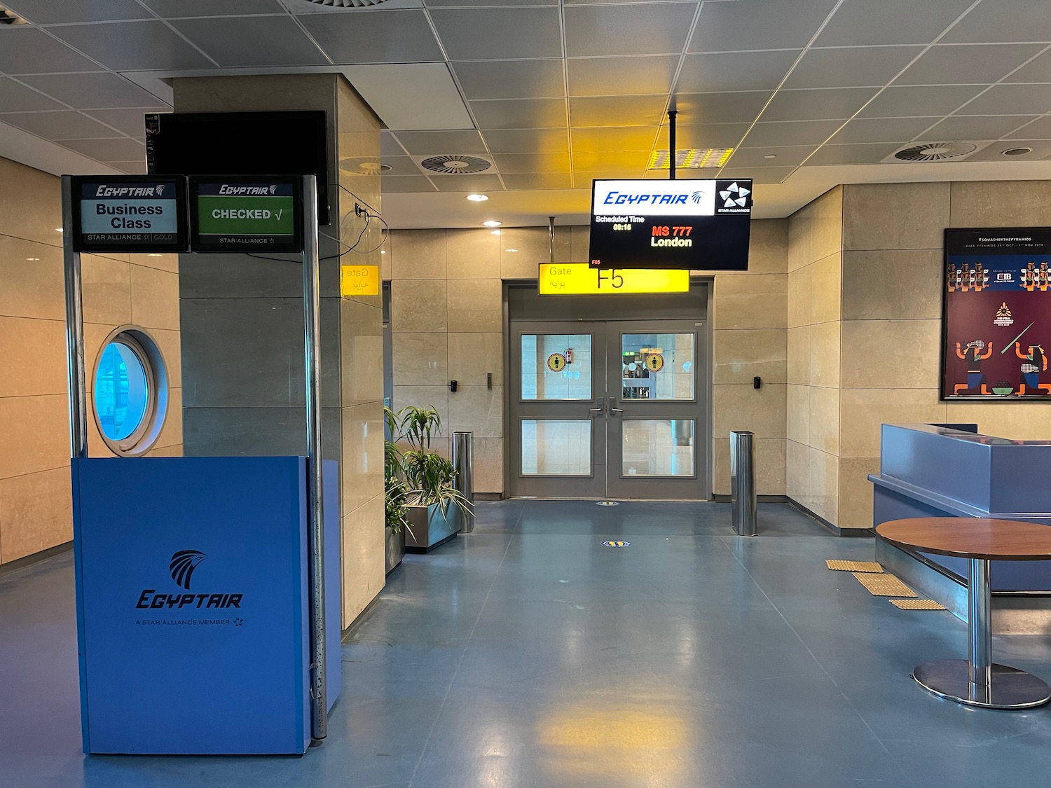 a hallway with signs and a window