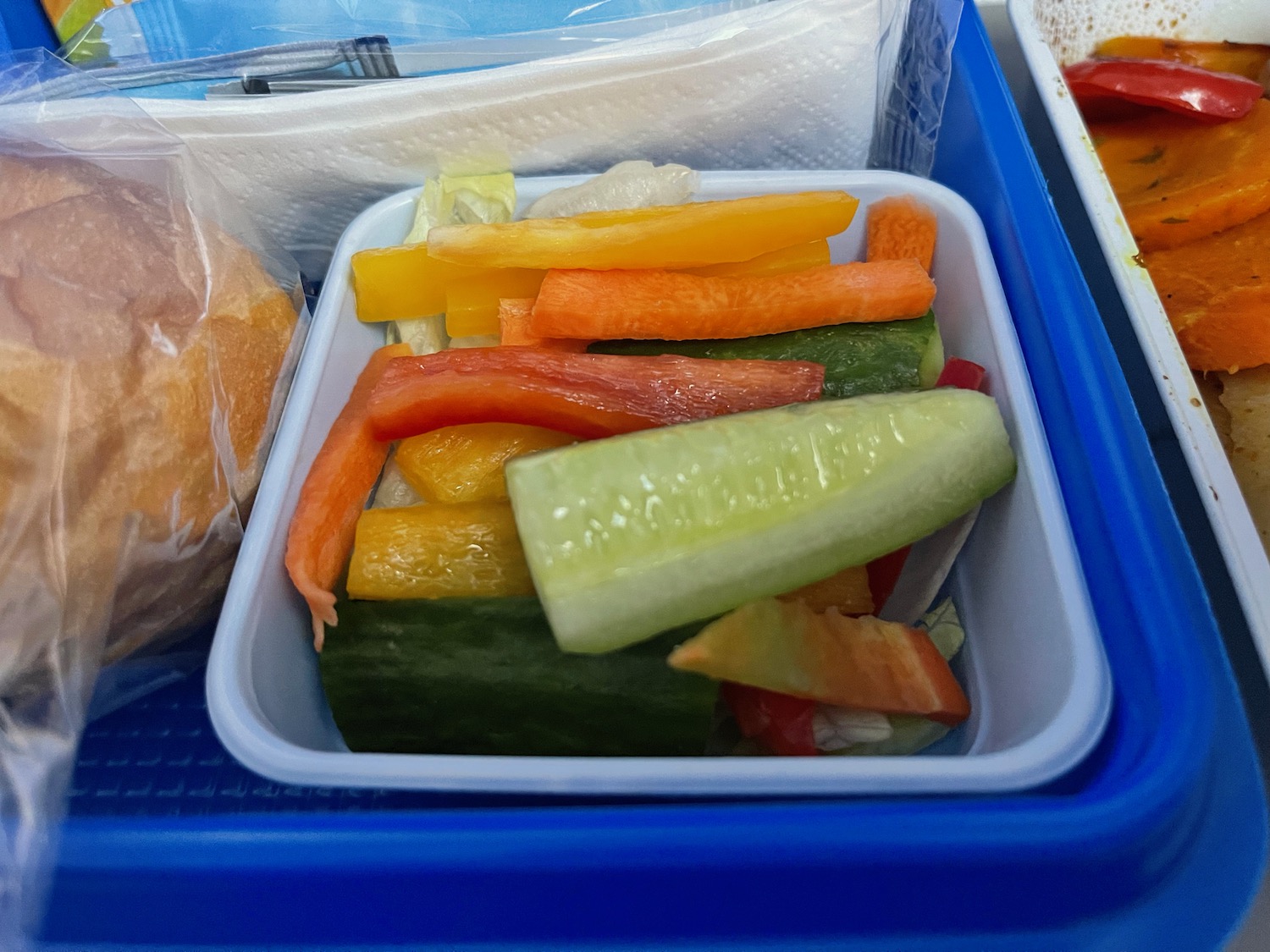 a container of vegetables in a plastic container