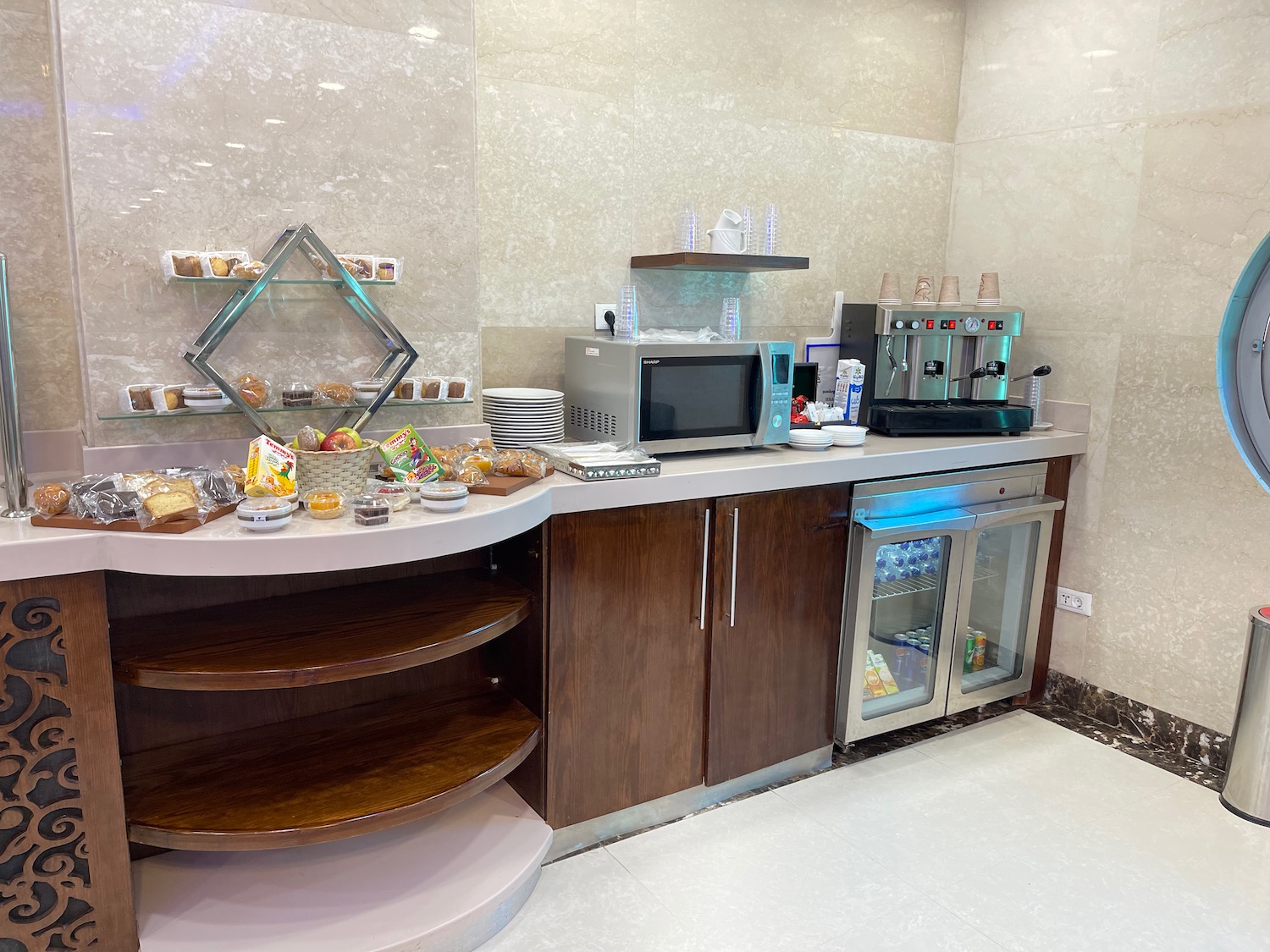 a kitchen with a counter top and a microwave