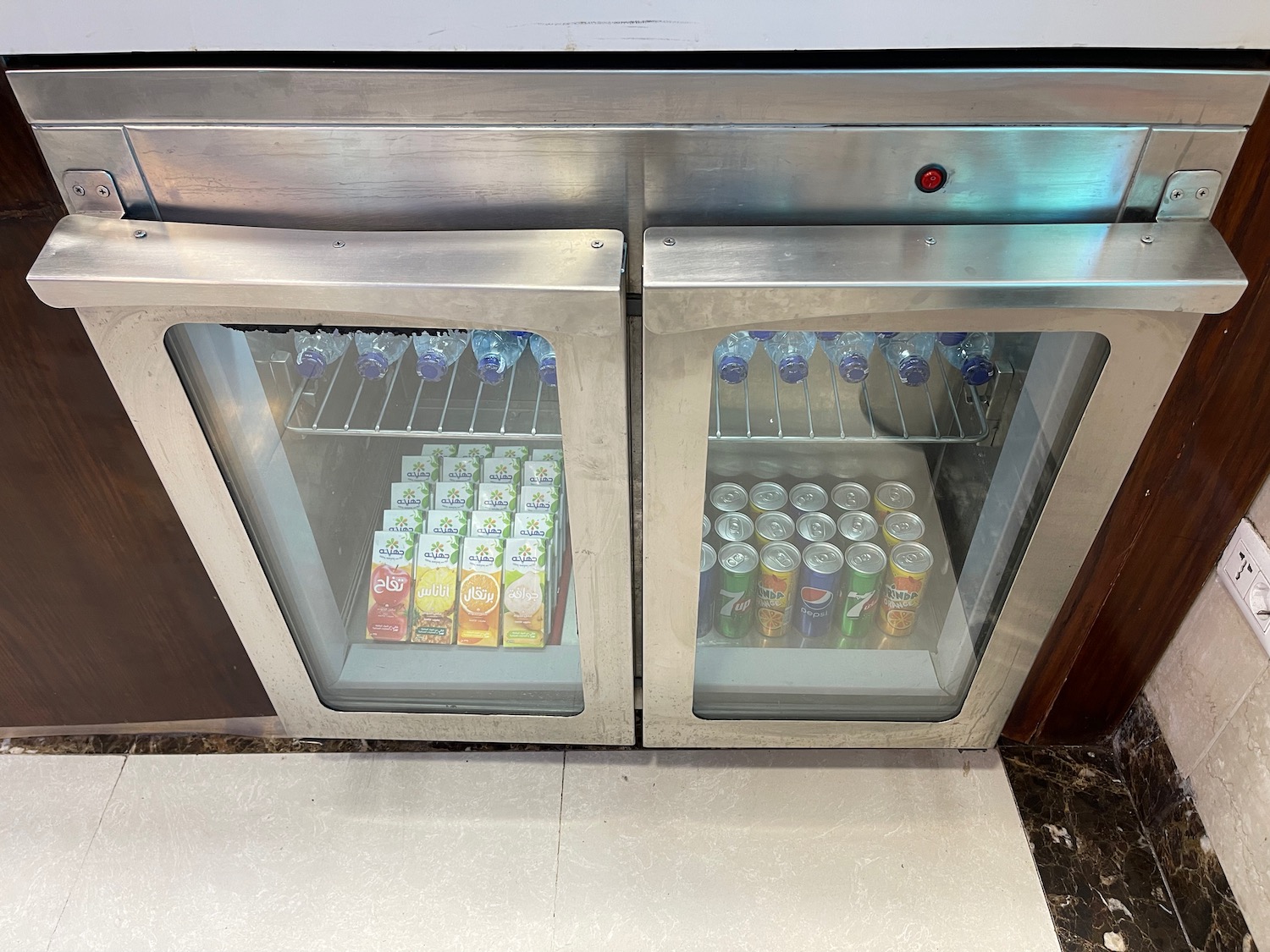 a refrigerator with drinks in it