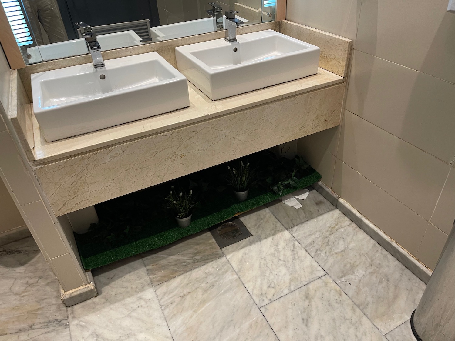 a bathroom with two sinks