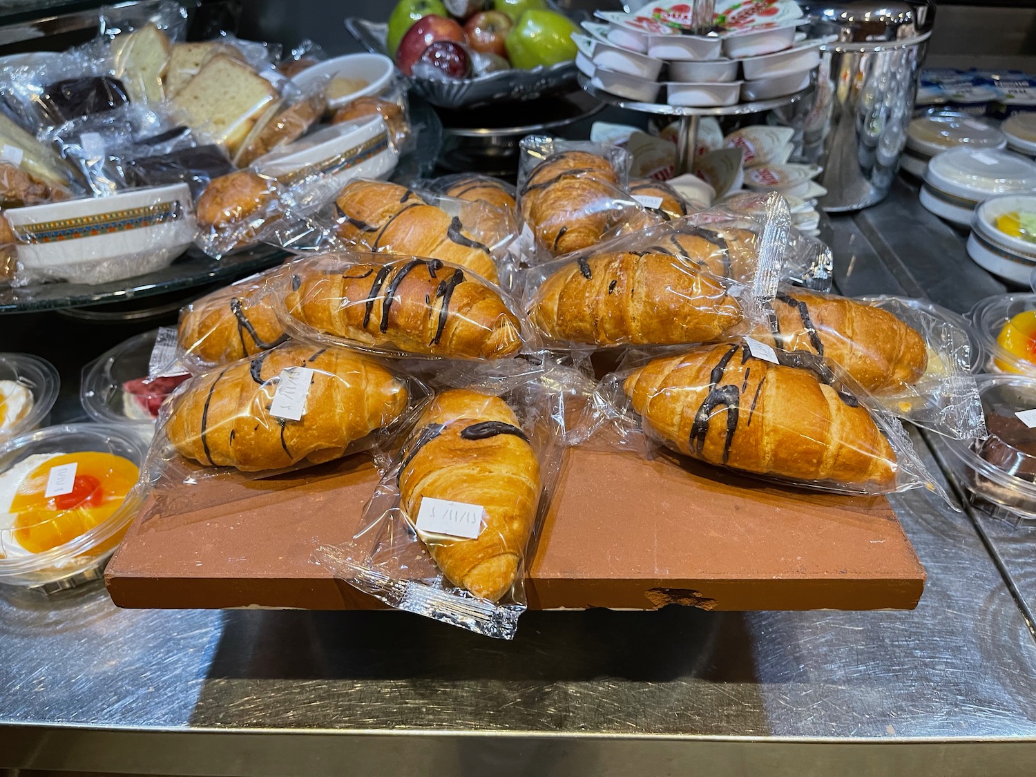 a group of croissants wrapped in plastic