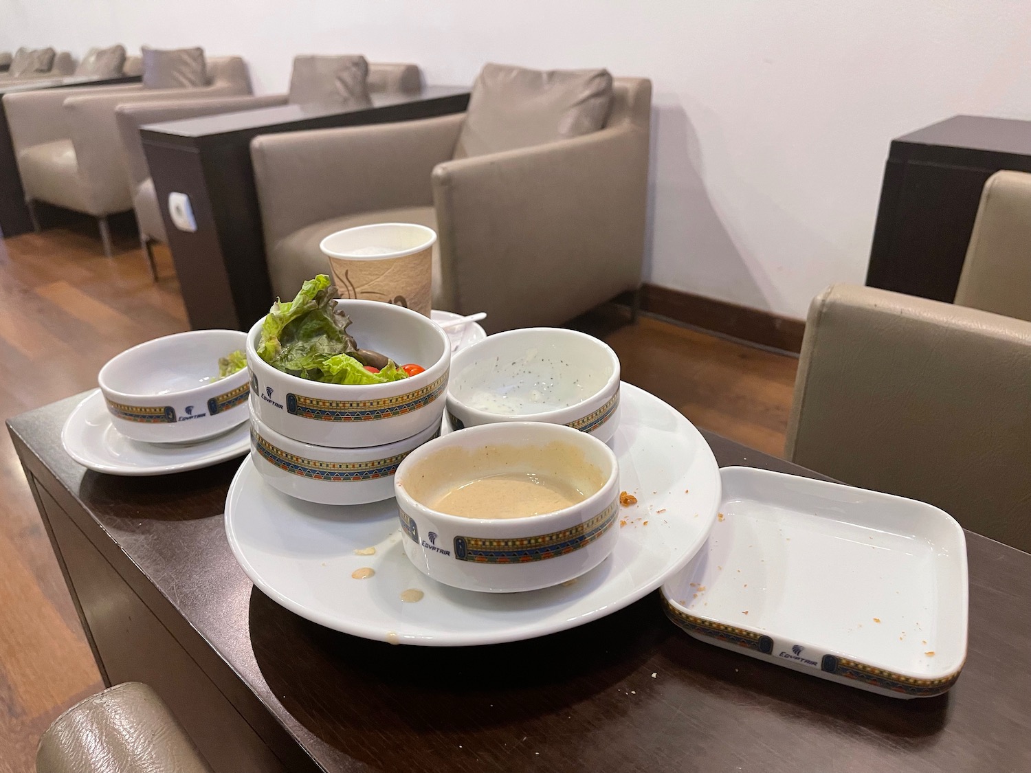 a plate with bowls and food on it