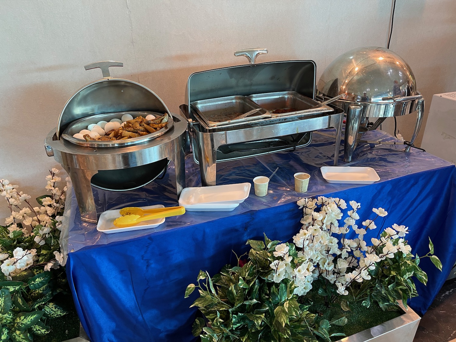 a buffet set up with food on a table