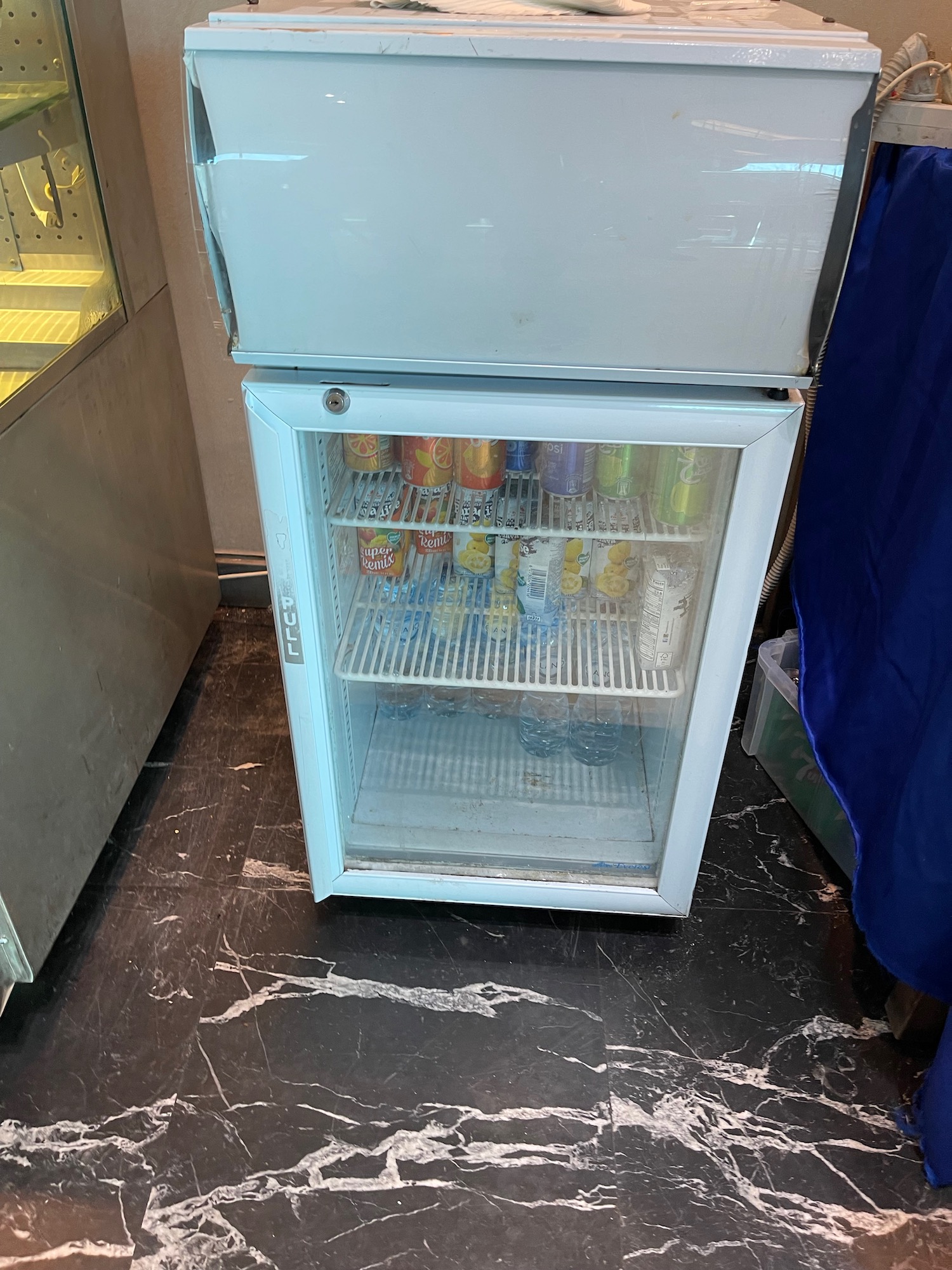 a refrigerator with drinks in it