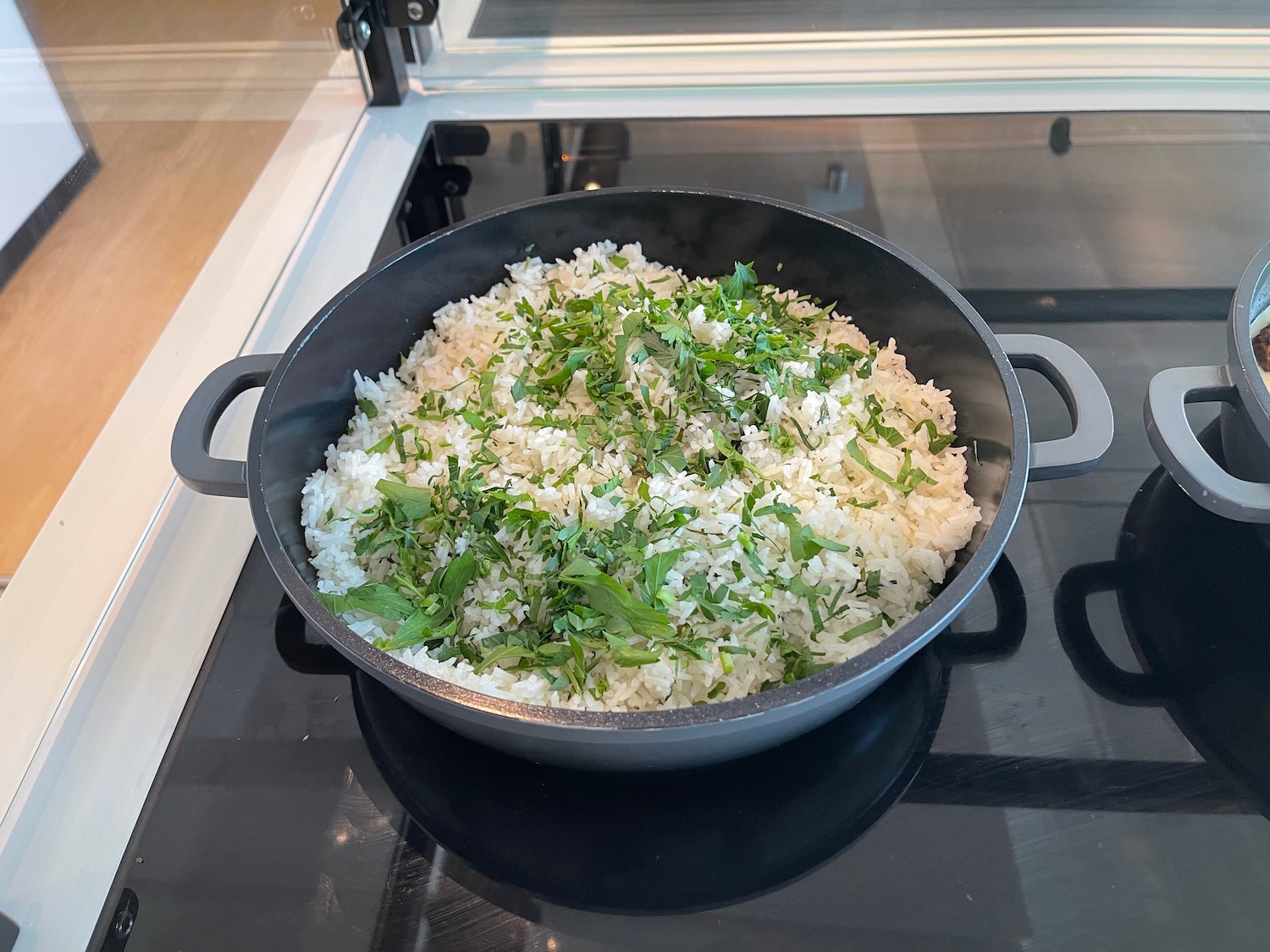 a pan of rice and herbs