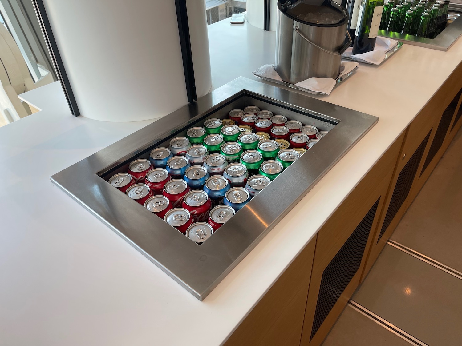 a group of cans in a cooler