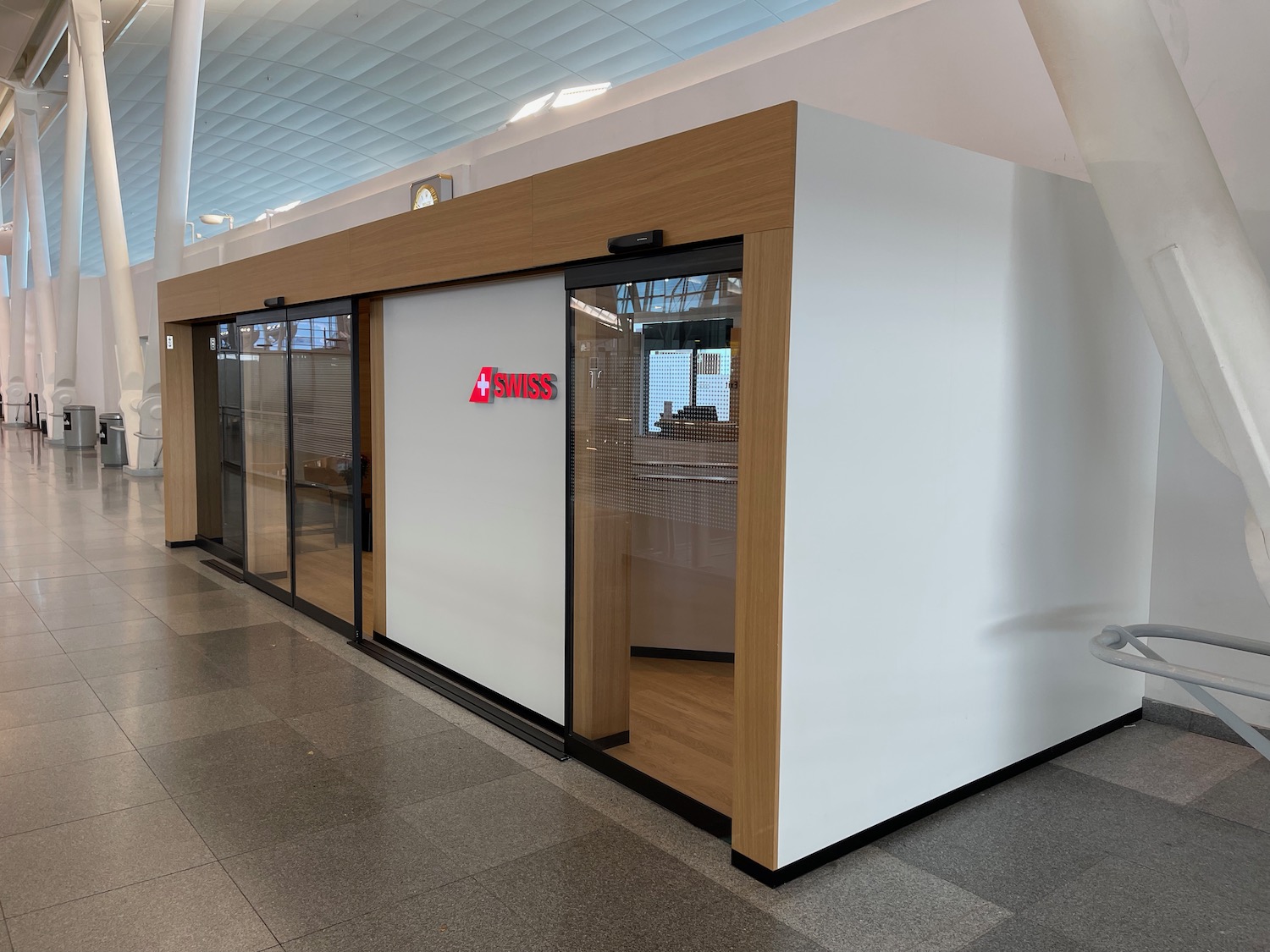 a white building with glass doors