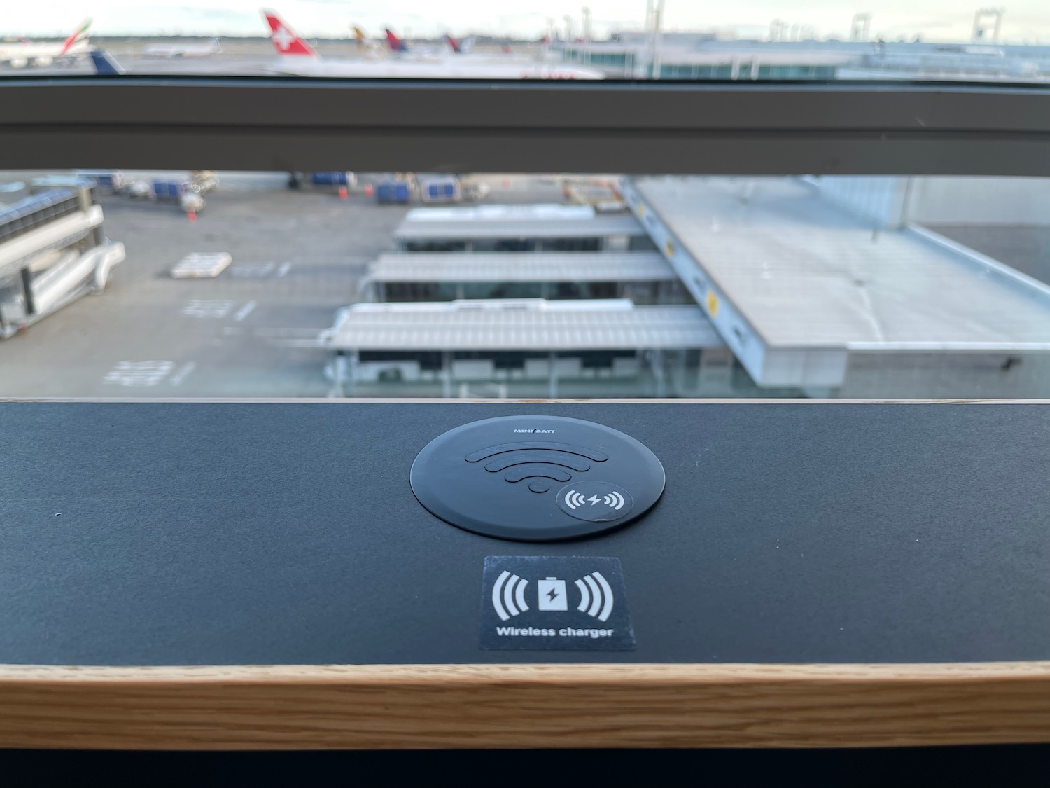 a wireless charger on a window sill