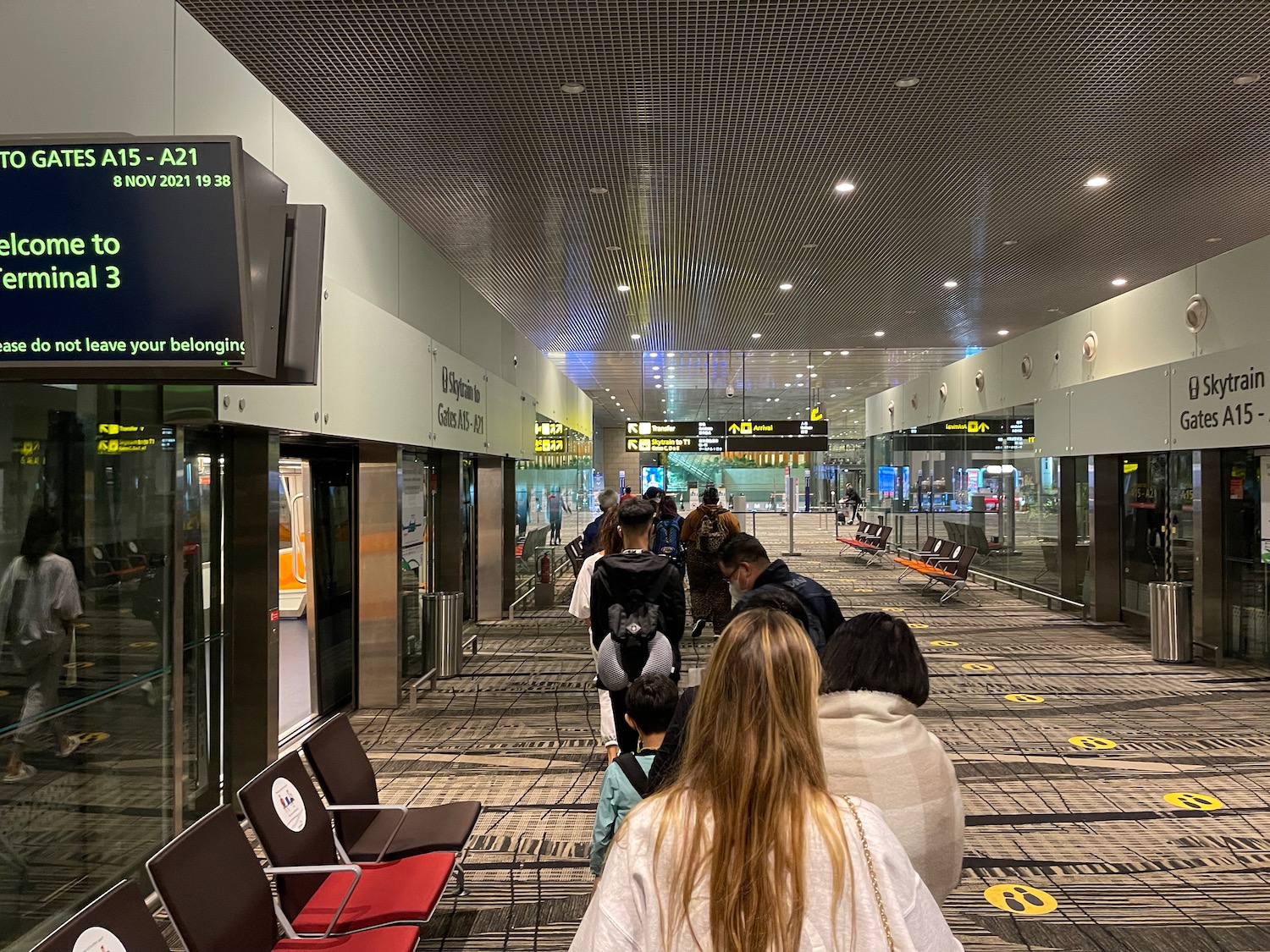 a group of people in an airport