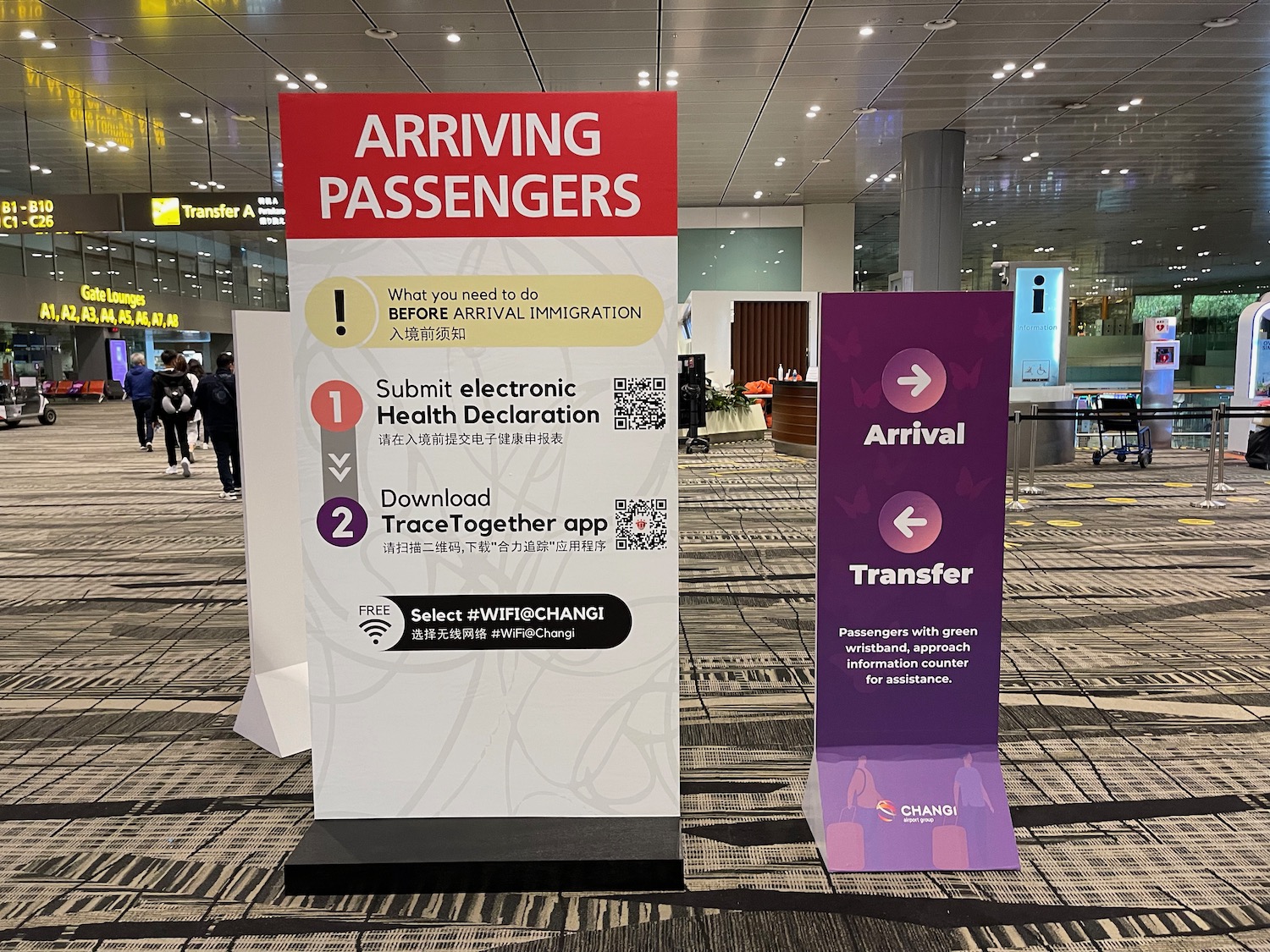 a group of signs in a airport