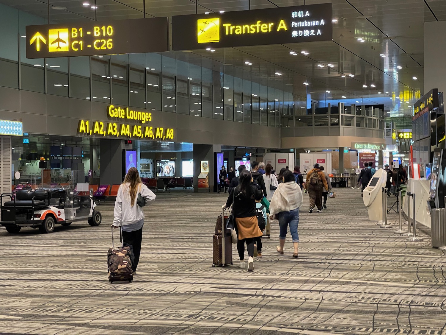 people walking in an airport