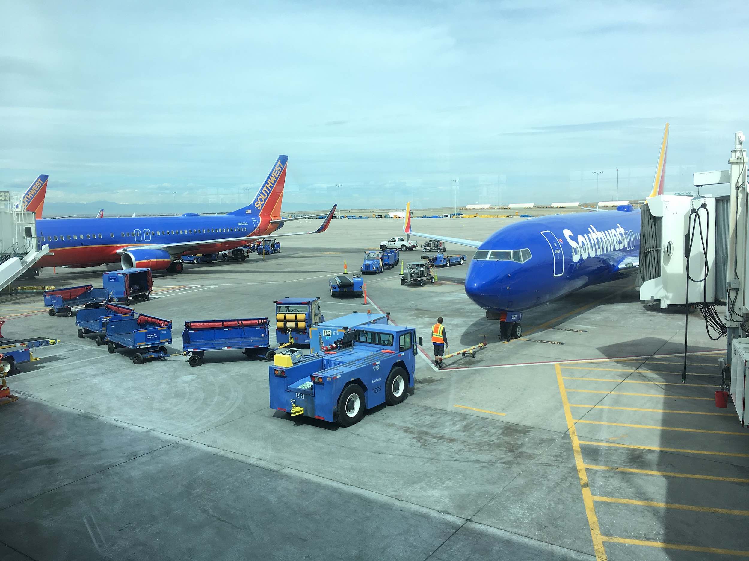a group of airplanes parked on a tarmac