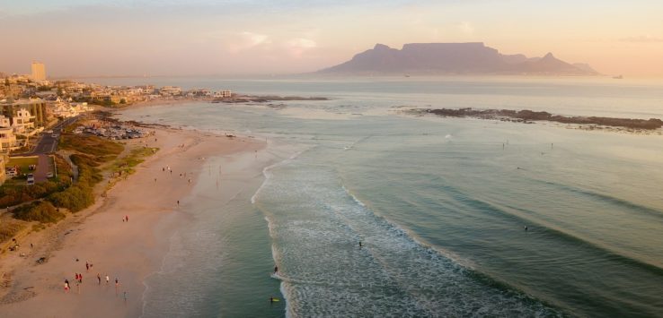 a beach with people on it