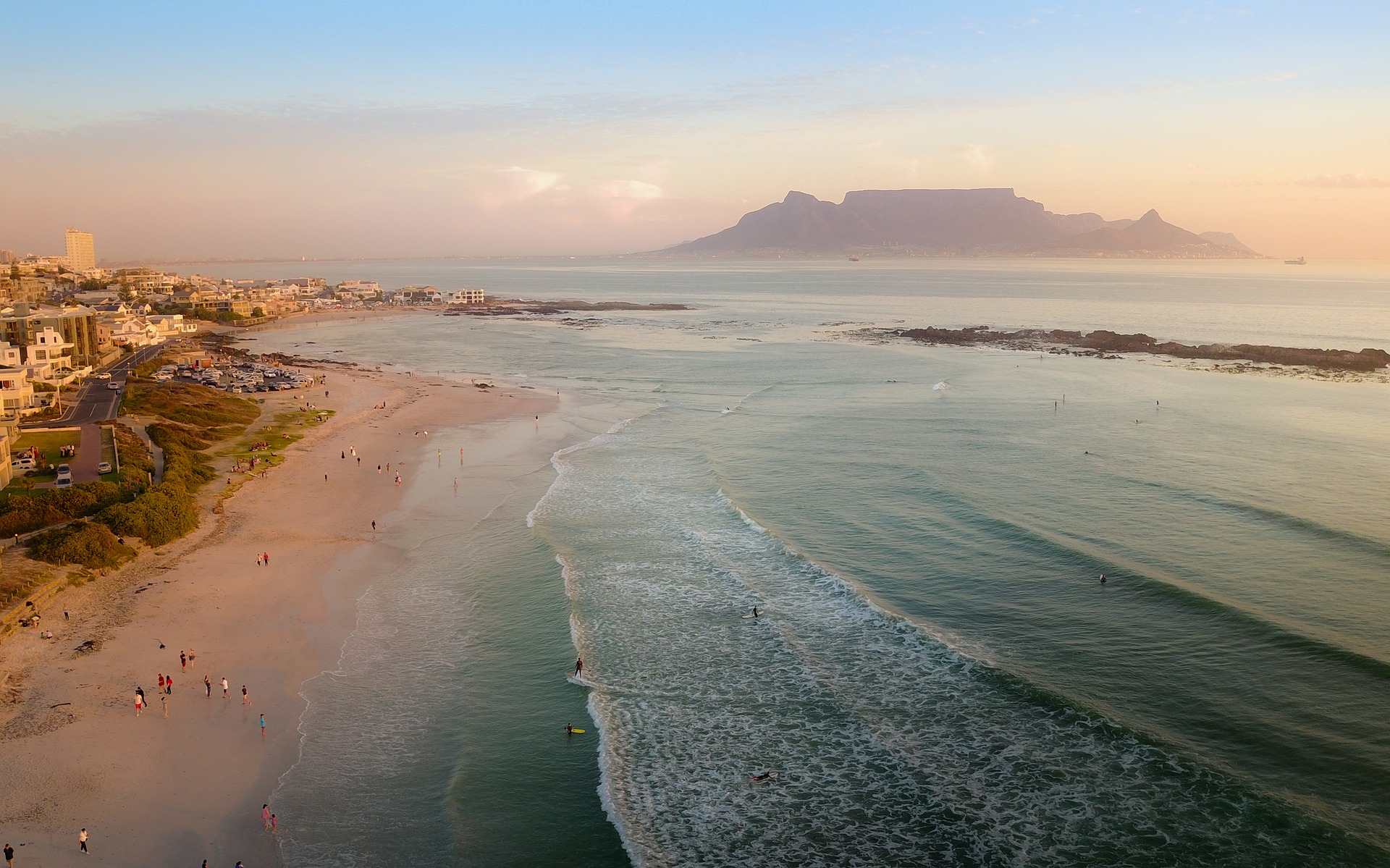 a beach with people on it