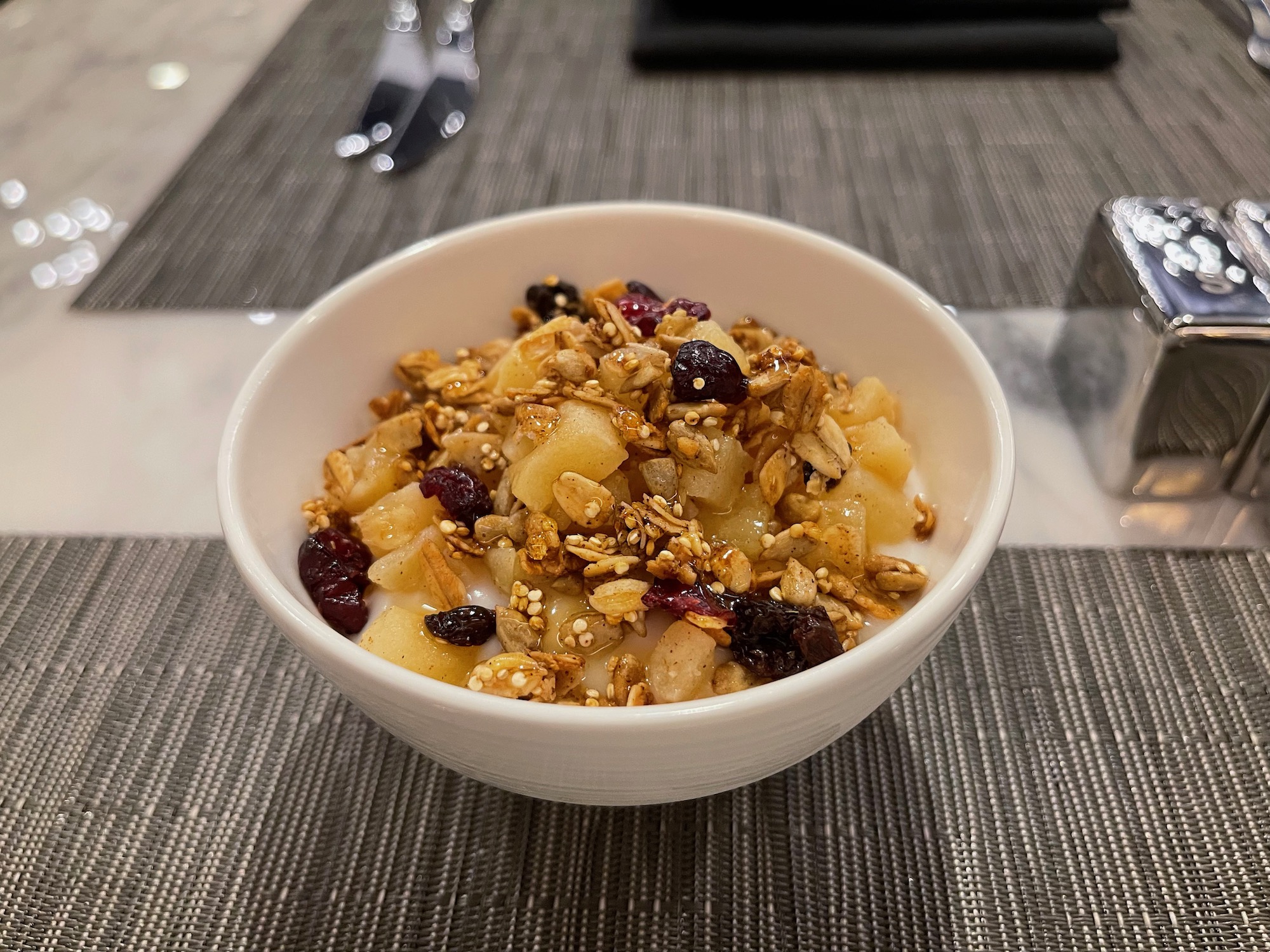 a bowl of food on a place mat