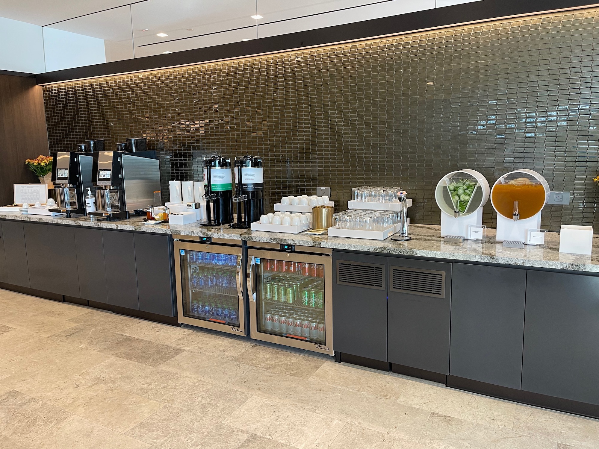 a counter with drinks and beverages