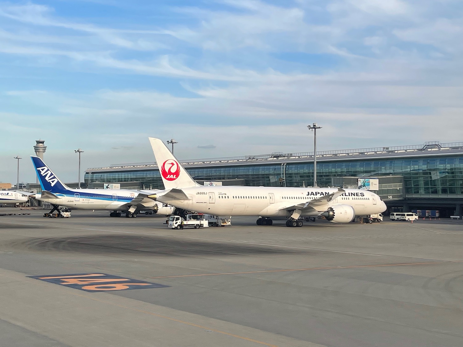 airplanes parked at an airport