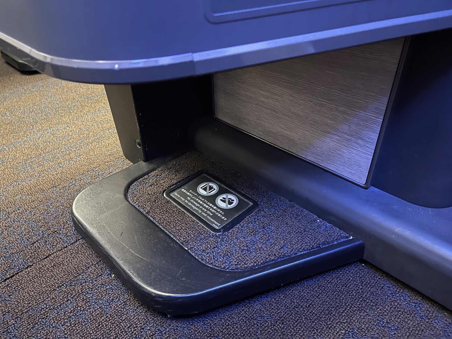 a foot step under a chair