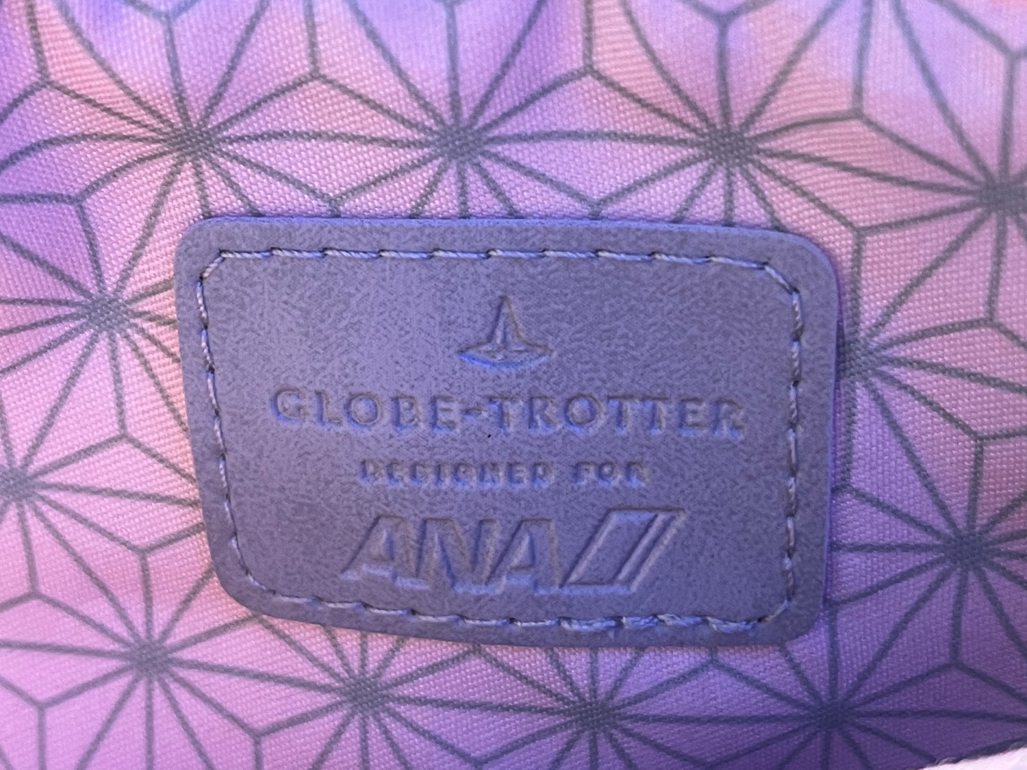 a close up of a leather label