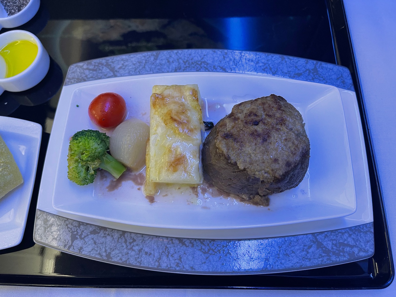 a plate of food on a tray