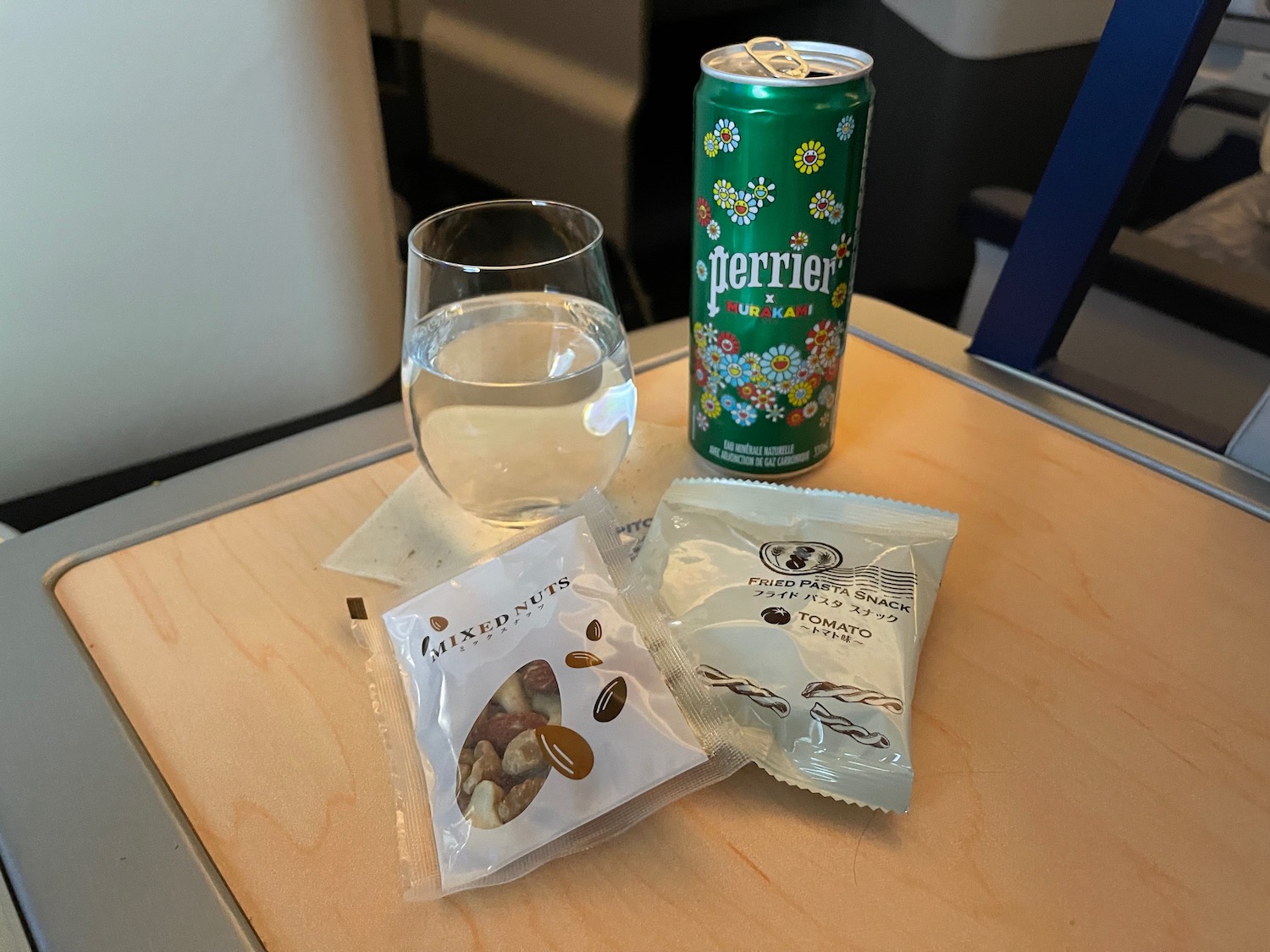 a drink and a can on a table