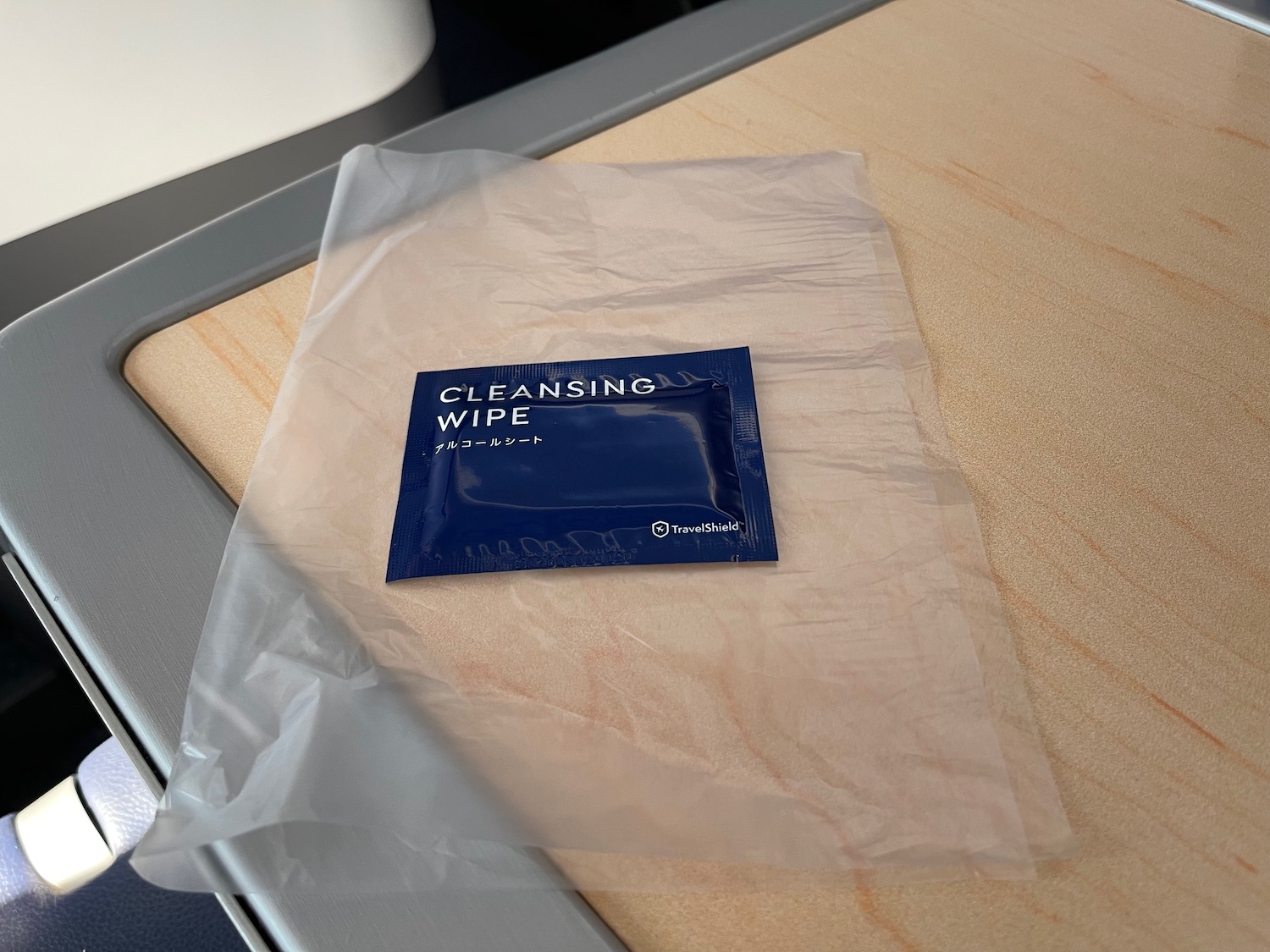 a blue packet on a plastic bag