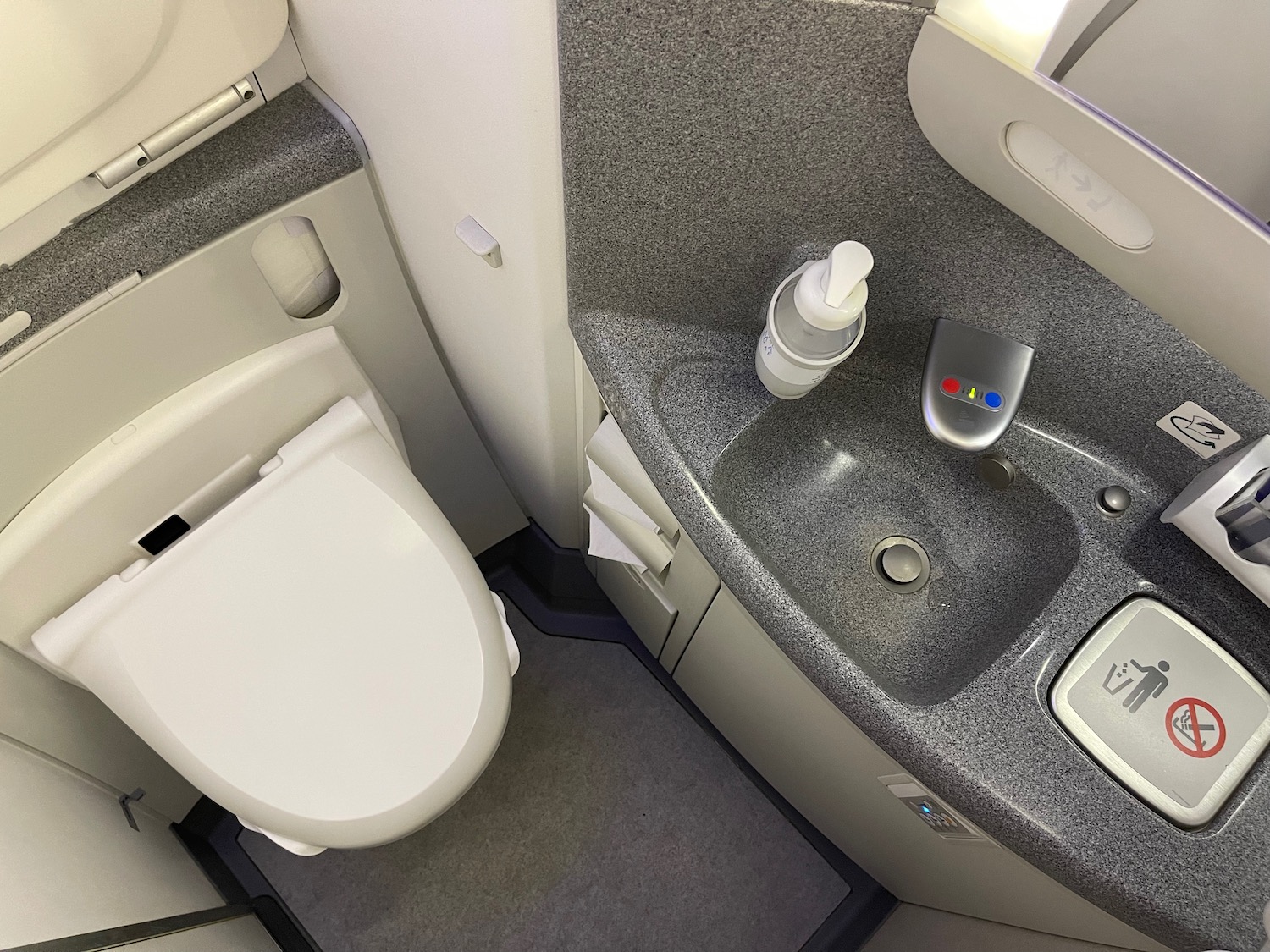 a sink and toilet in a bathroom