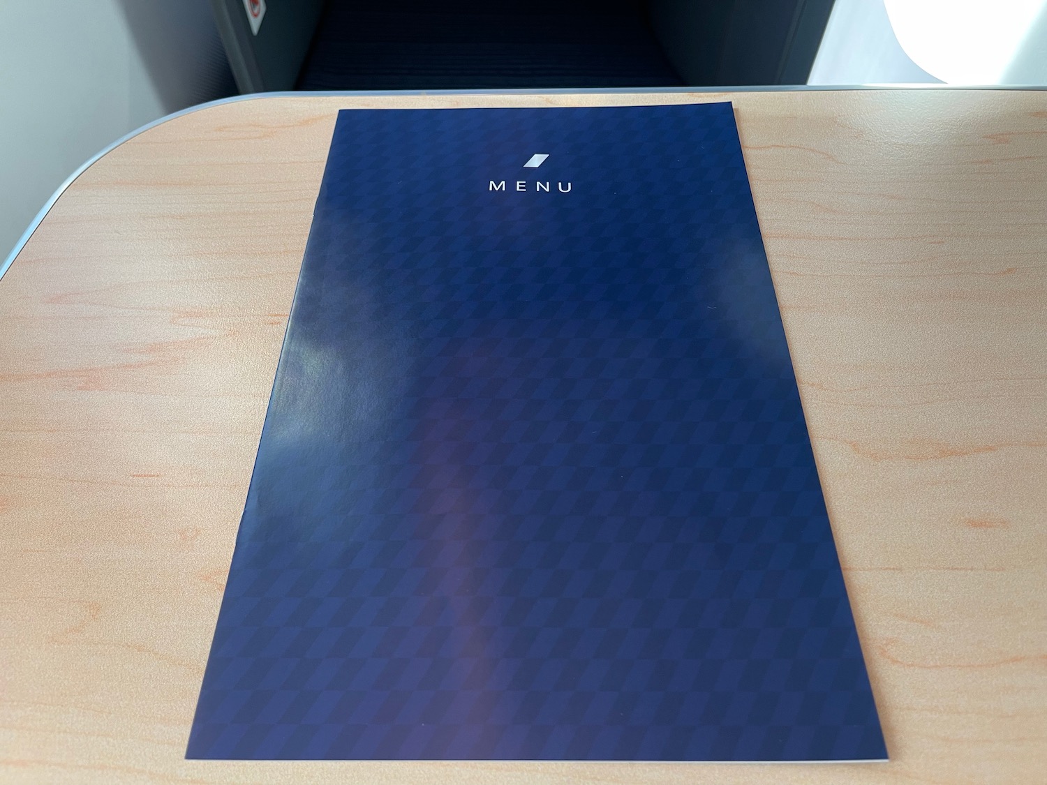 a blue menu on a table