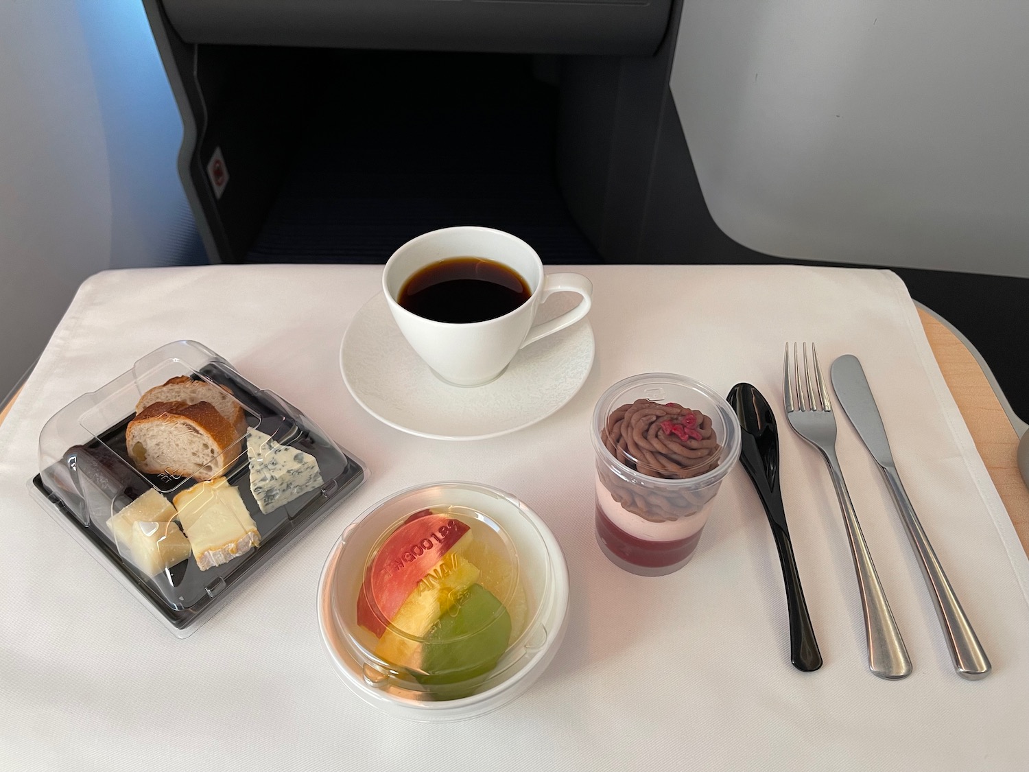 a table with food and utensils on it