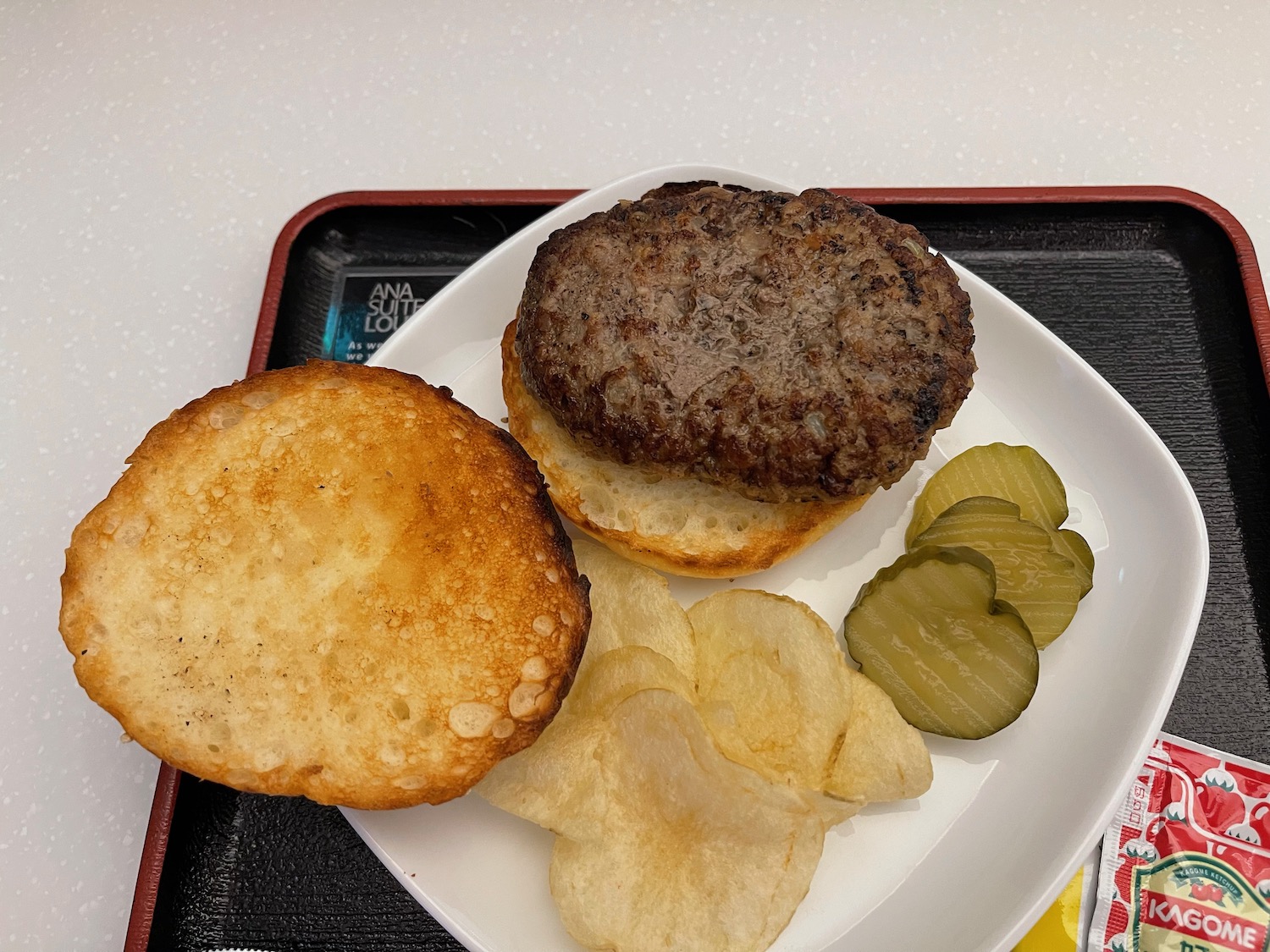 a plate of burgers and chips