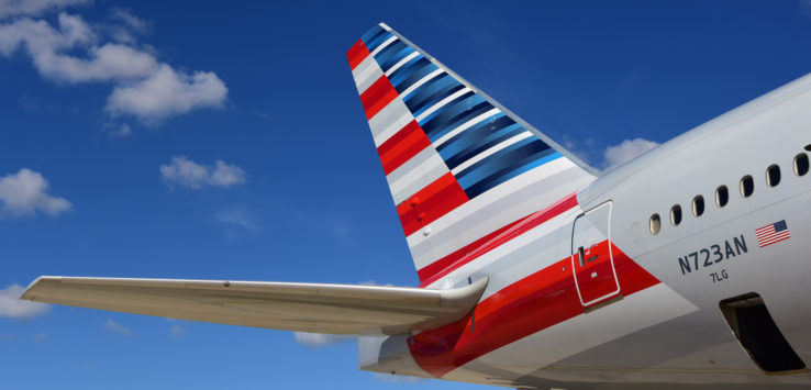 the tail of an airplane with stripes on it