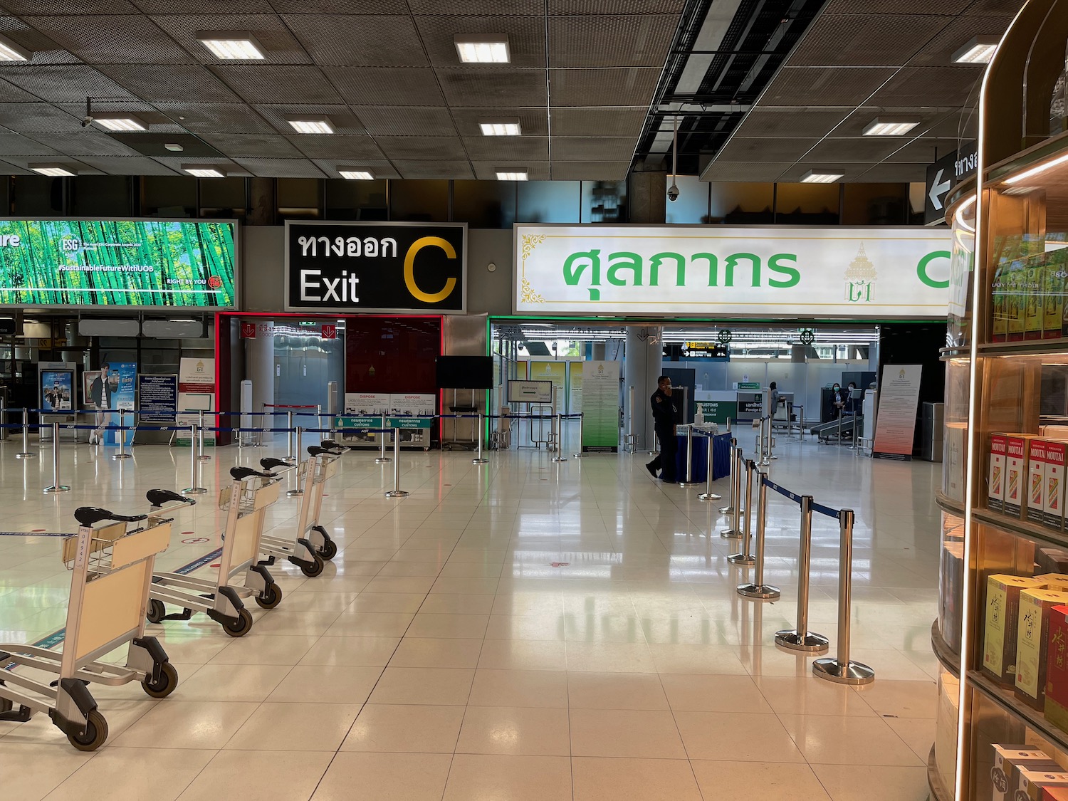 a large airport with luggage carts