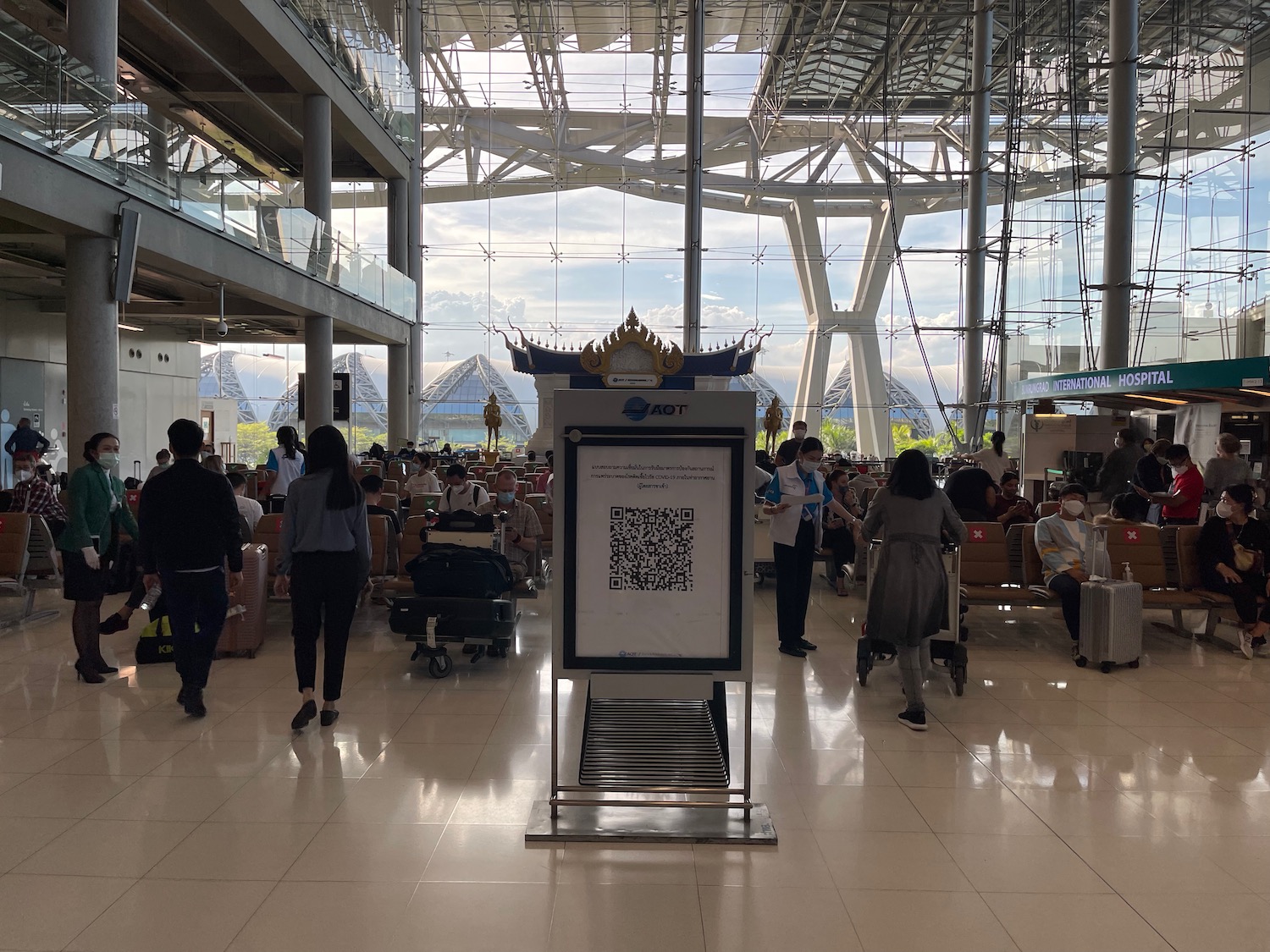 a group of people in a large airport