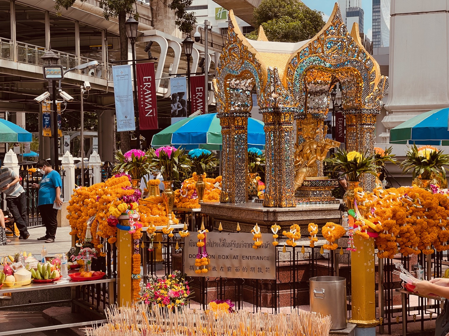 a shrine with flowers and candles