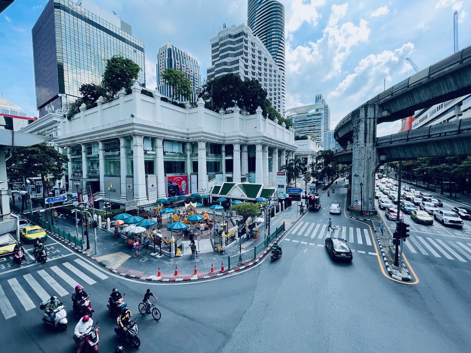 a city street with cars and people on it