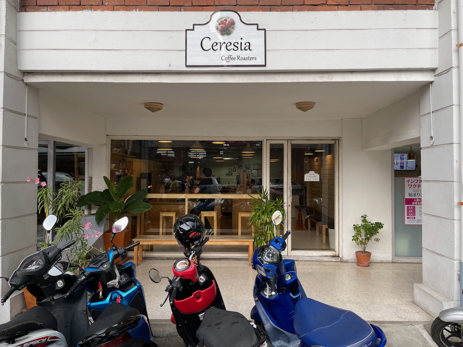 a group of motorcycles parked outside of a building