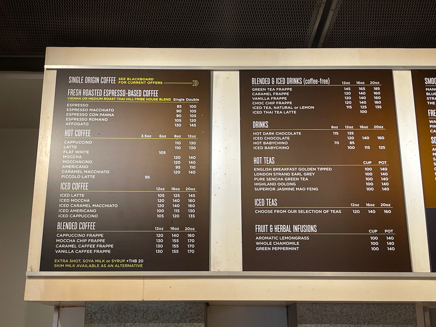 a menu board with white text
