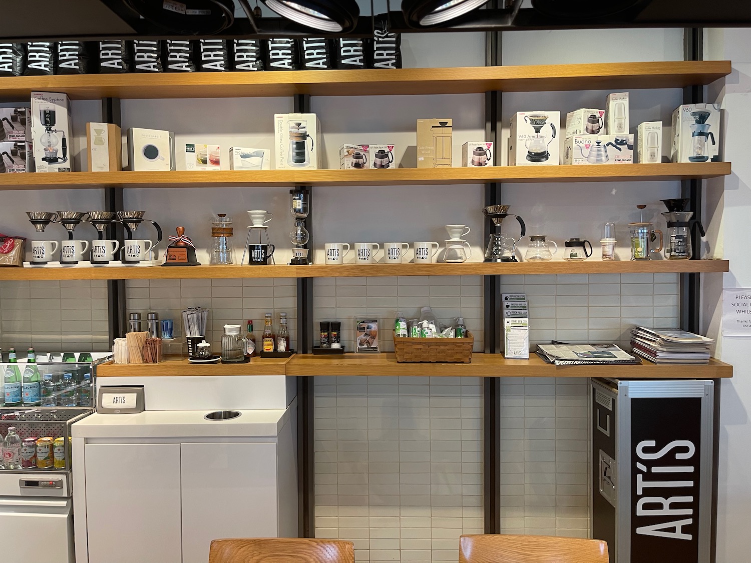 a shelves with cups and mugs on them