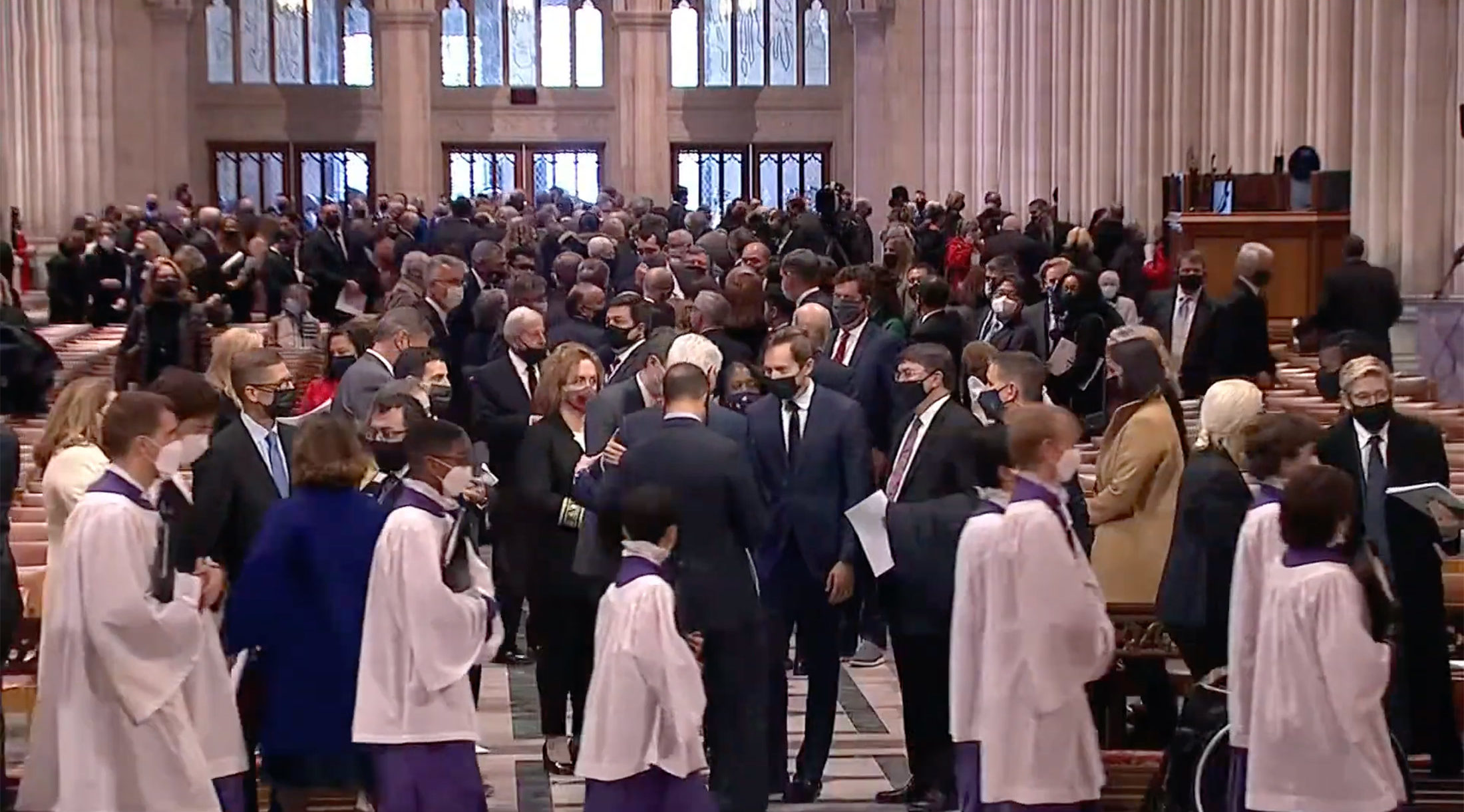 a group of people in a large room