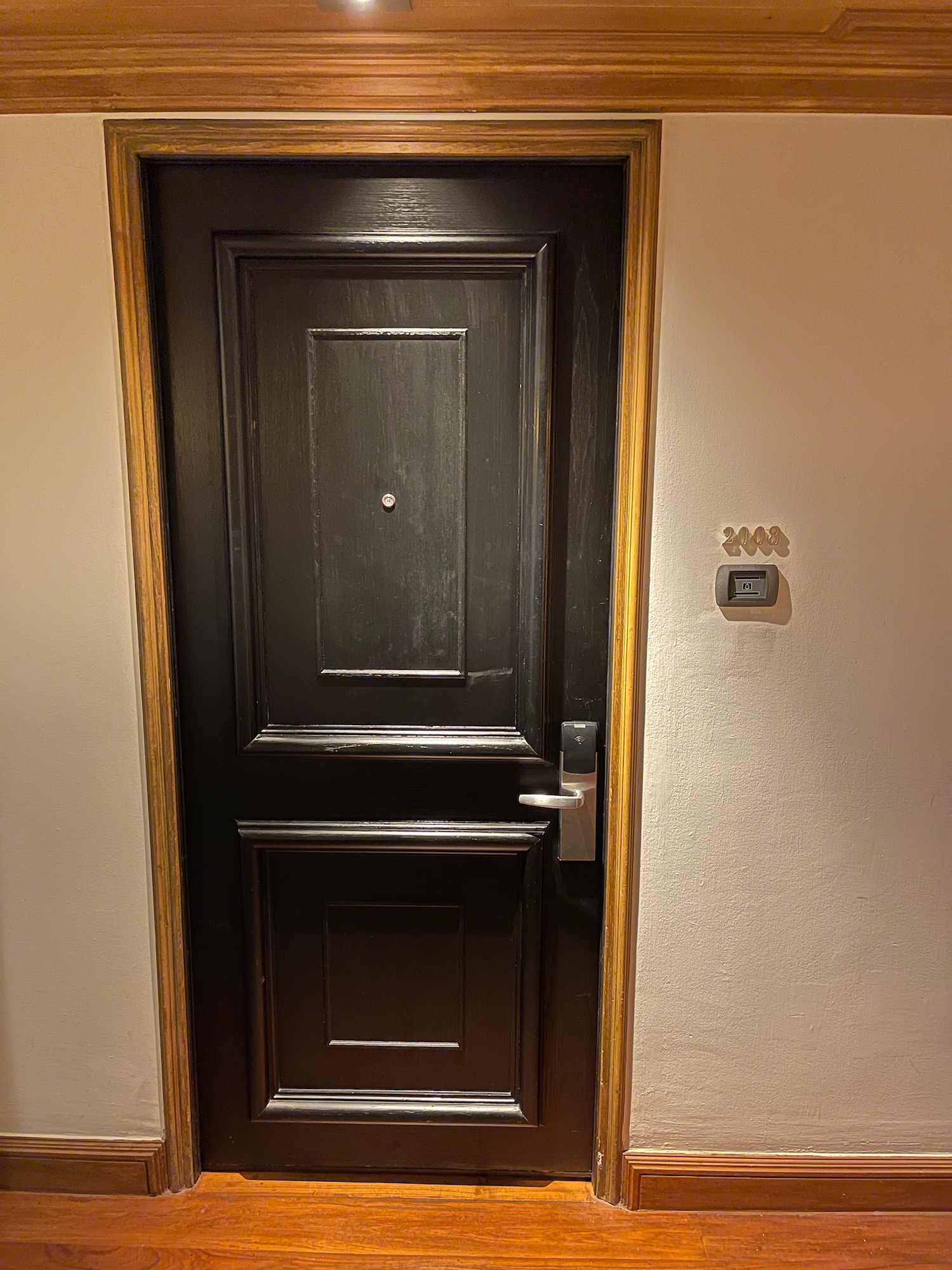 a black door with a silver handle