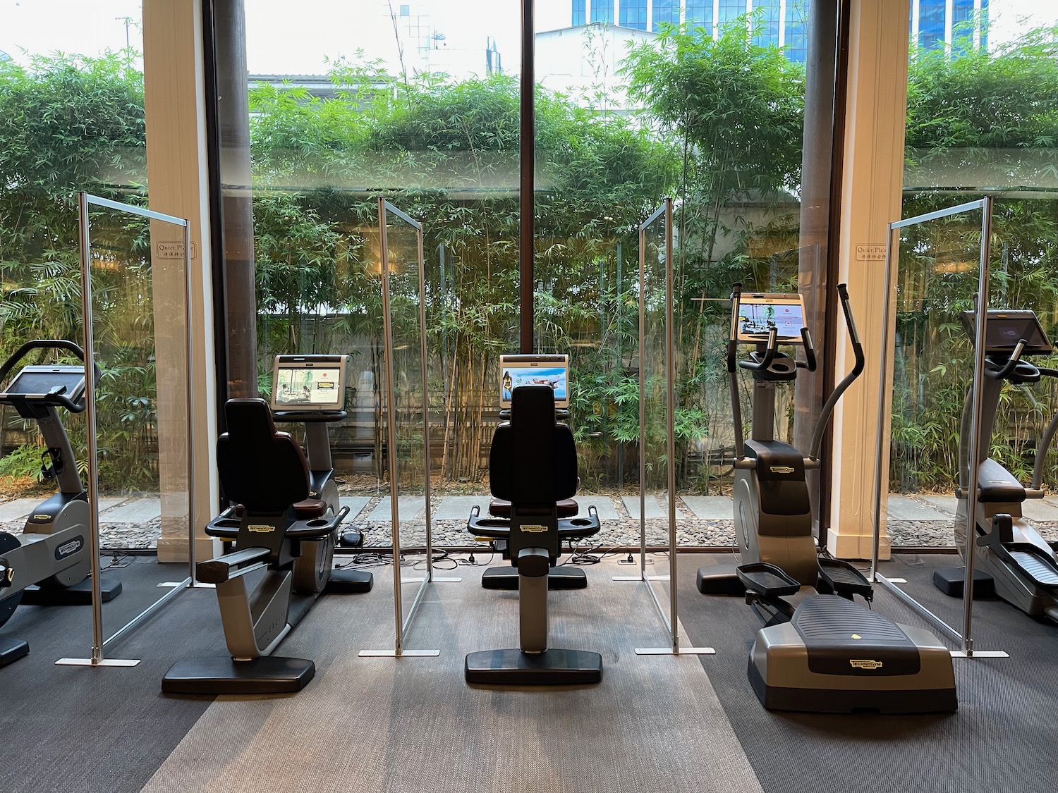 a group of exercise machines in a room